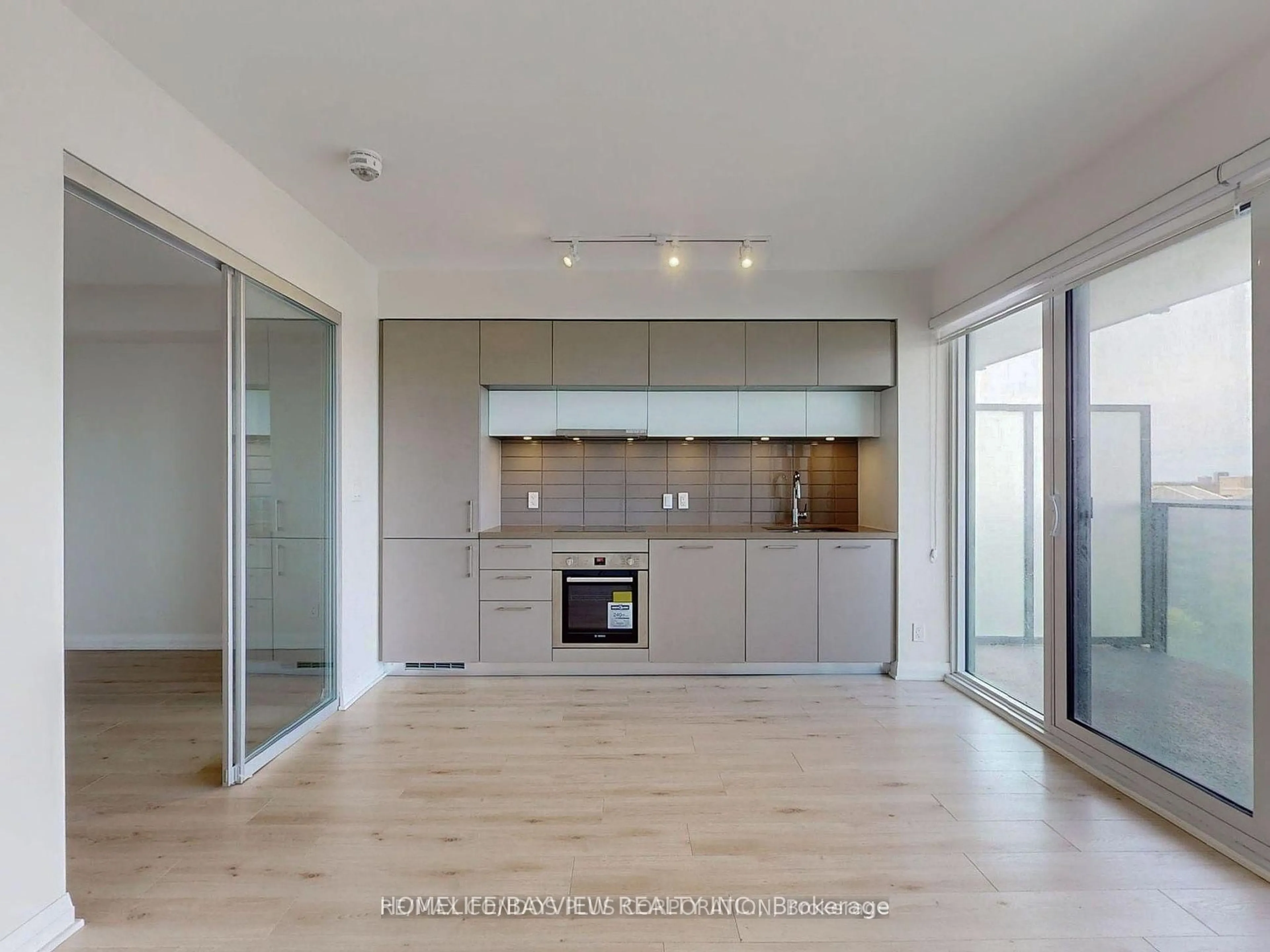 Open concept kitchen, wood/laminate floor for 99 Foxbar Rd #2305, Toronto Ontario M4V 0B2