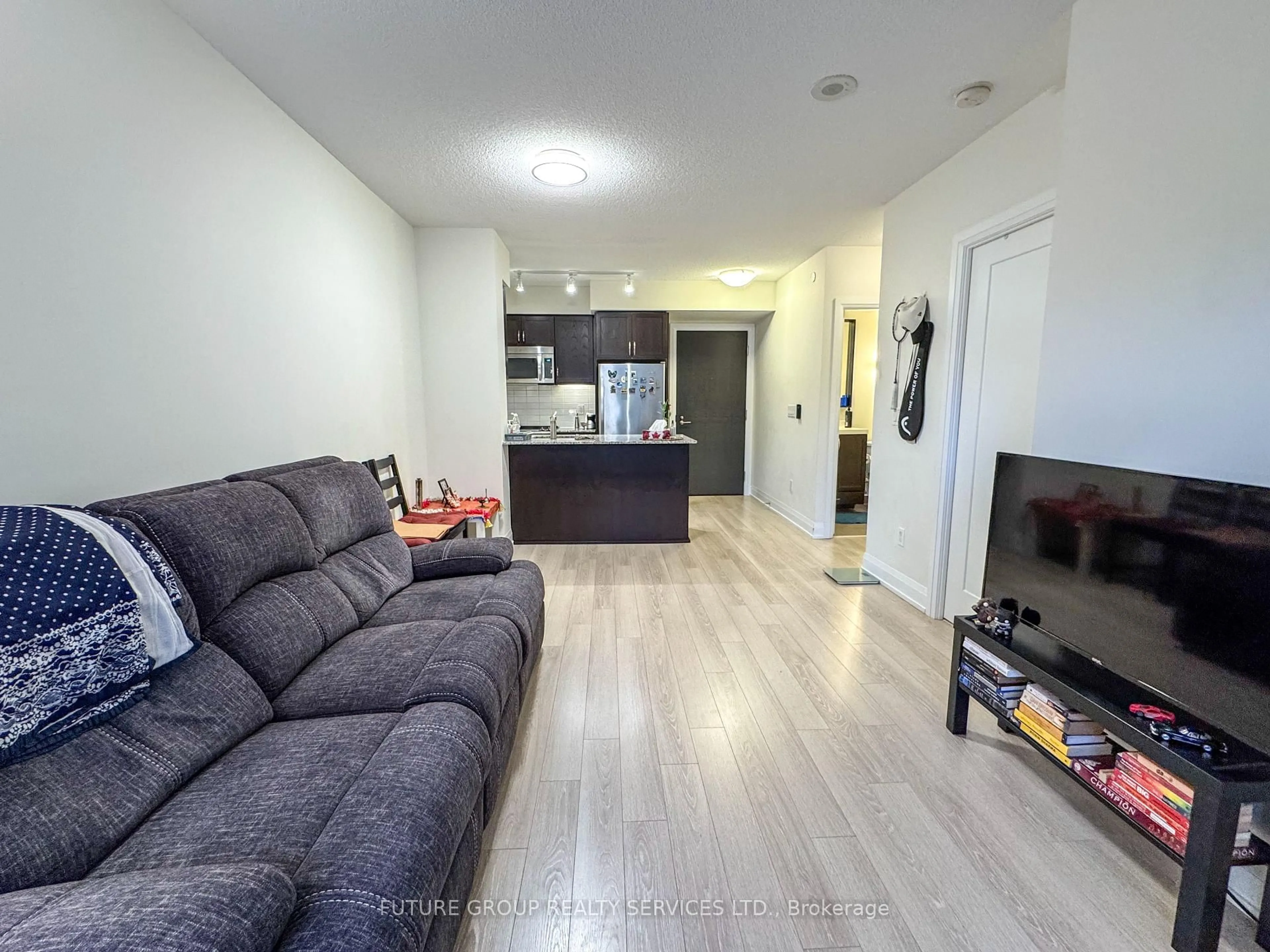 Living room with furniture, unknown for 18 Graydon Hall Dr #306, Toronto Ontario M3A 2Z9