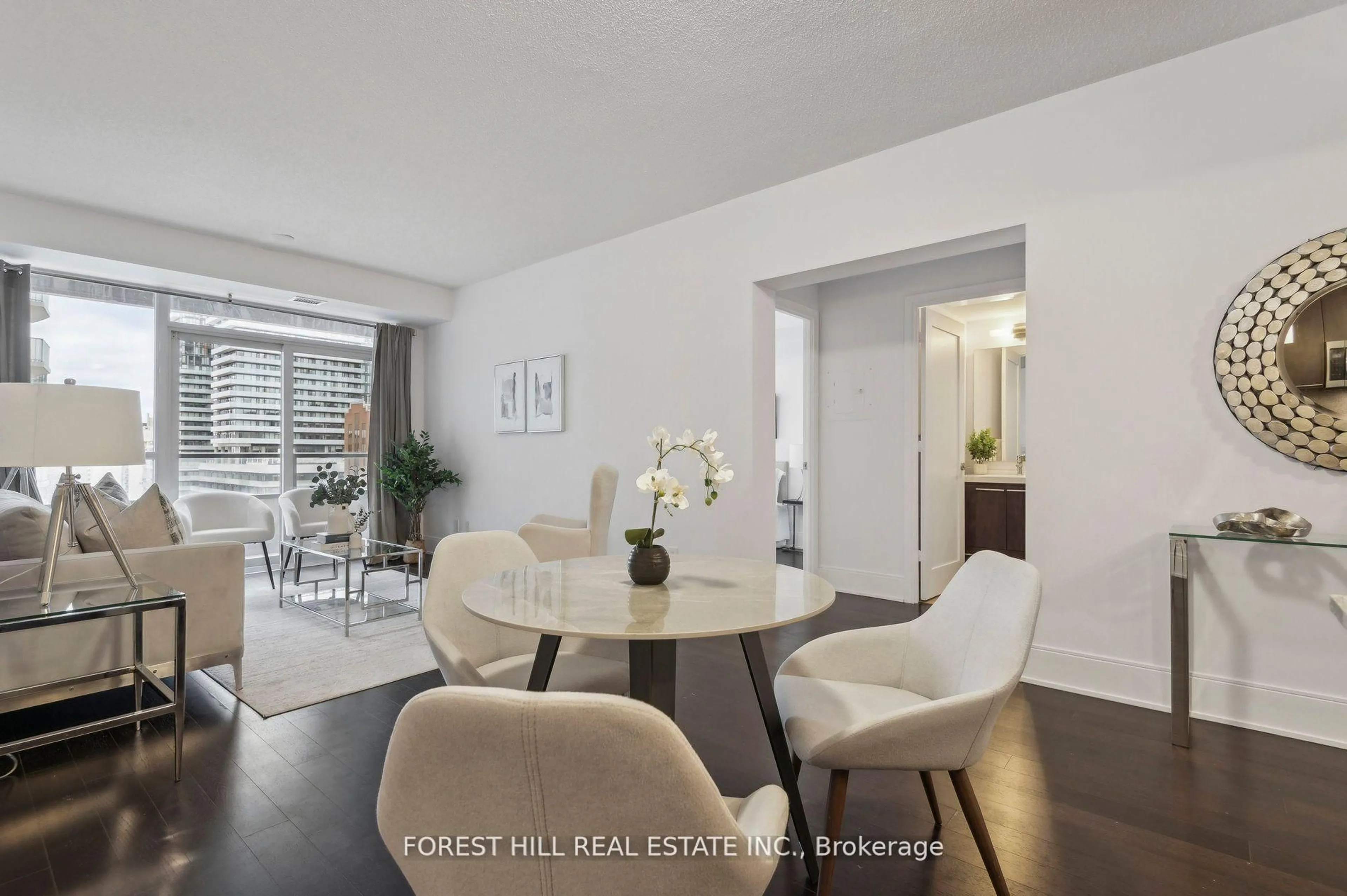 Dining room, wood/laminate floor for 70 Roehampton Ave #713, Toronto Ontario M4P 1R2