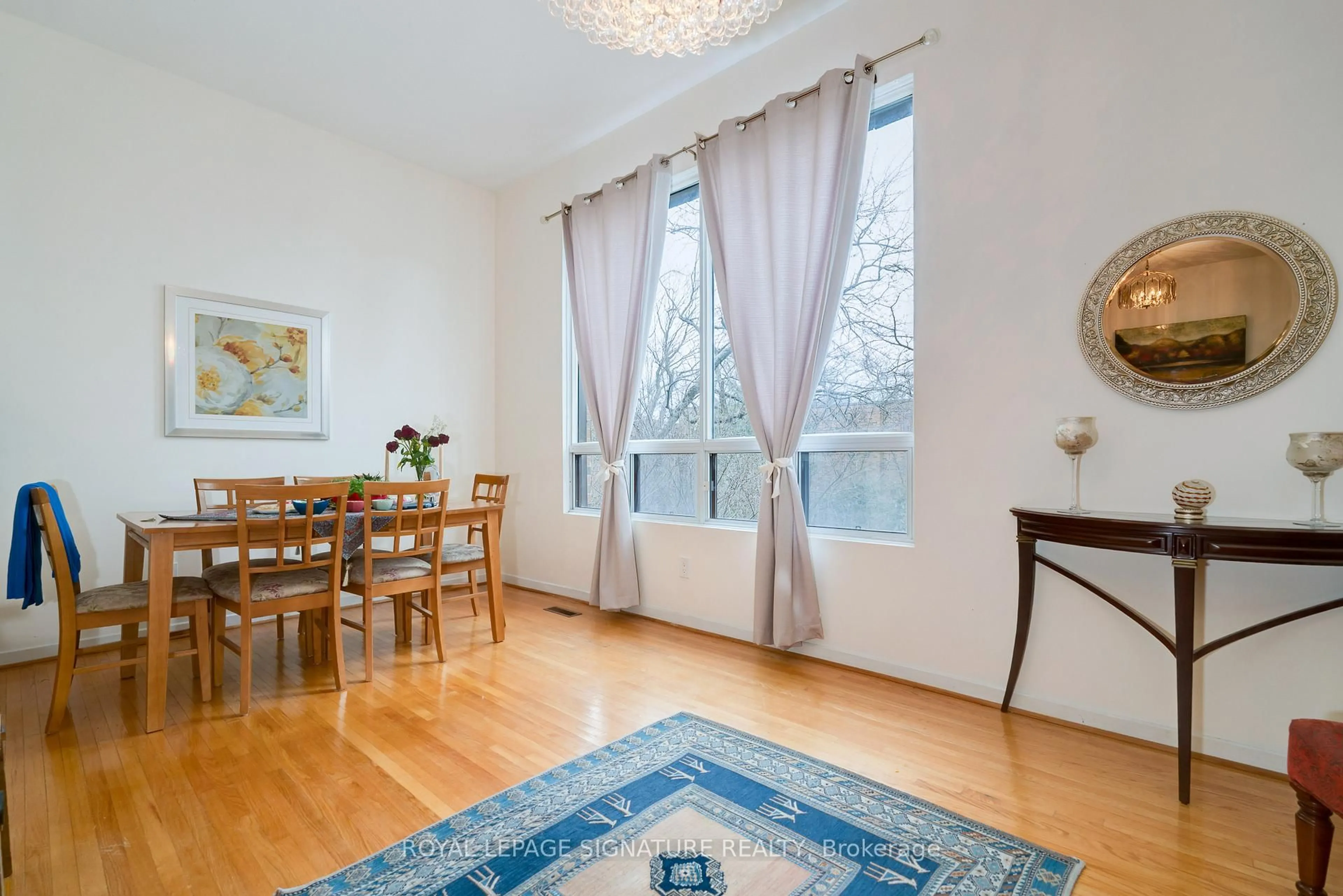 Dining room, wood/laminate floor for 19 Laurie Shepway, Toronto Ontario M2J 1X7