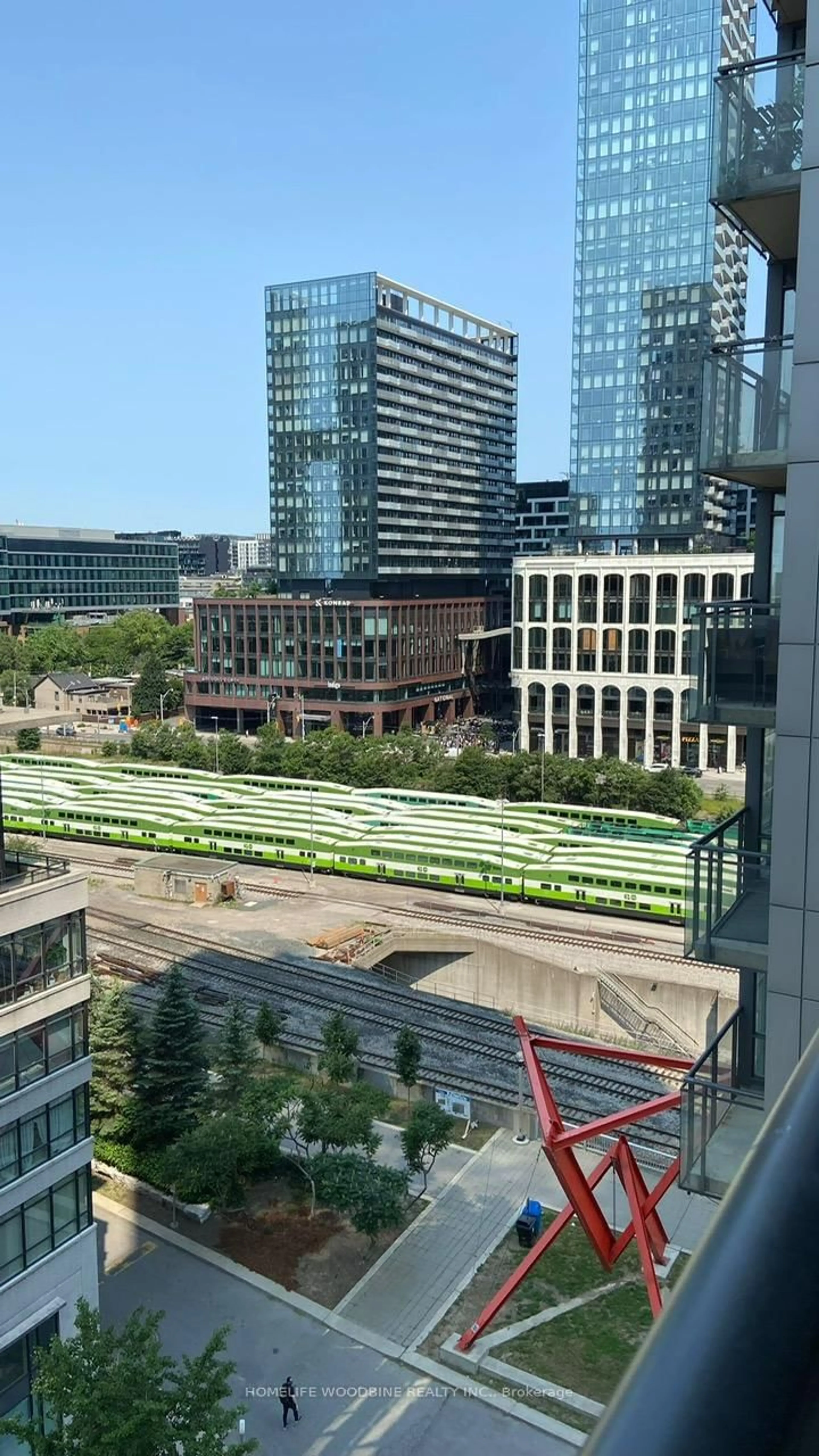 Balcony in the apartment, city buildings view from balcony for 25 Telegram Mews #1110, Toronto Ontario M5V 3Z1