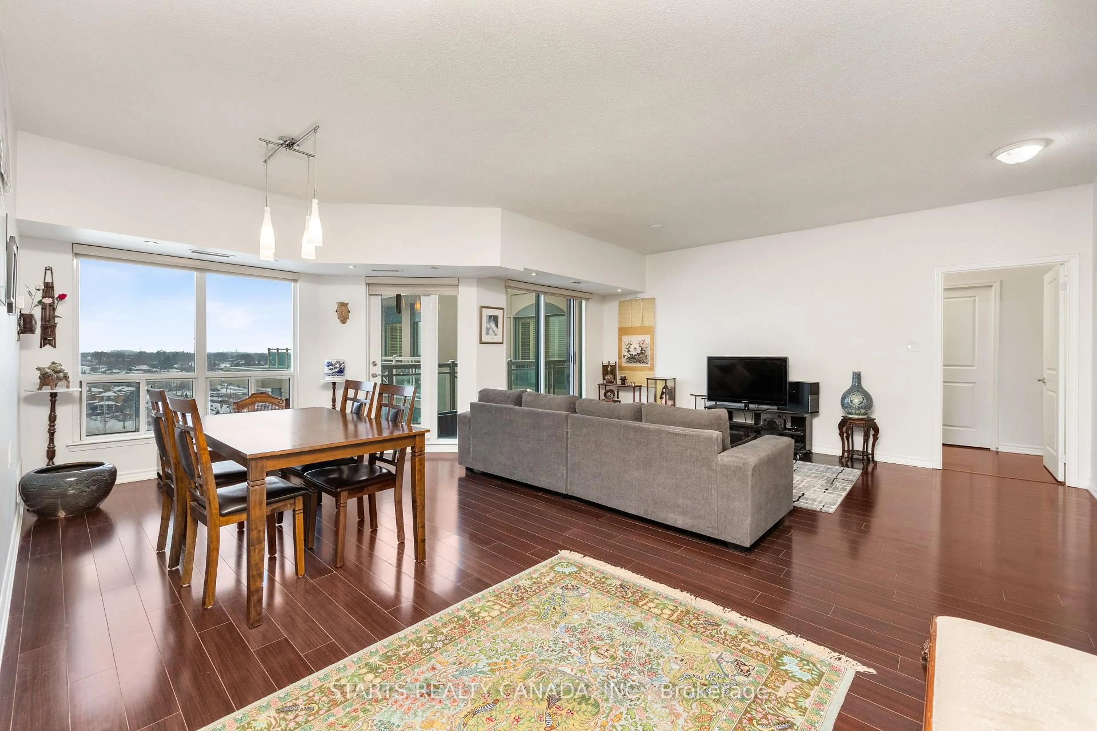 Living room with furniture, wood/laminate floor for 920 Sheppard Ave #910, Toronto Ontario M3H 0A2