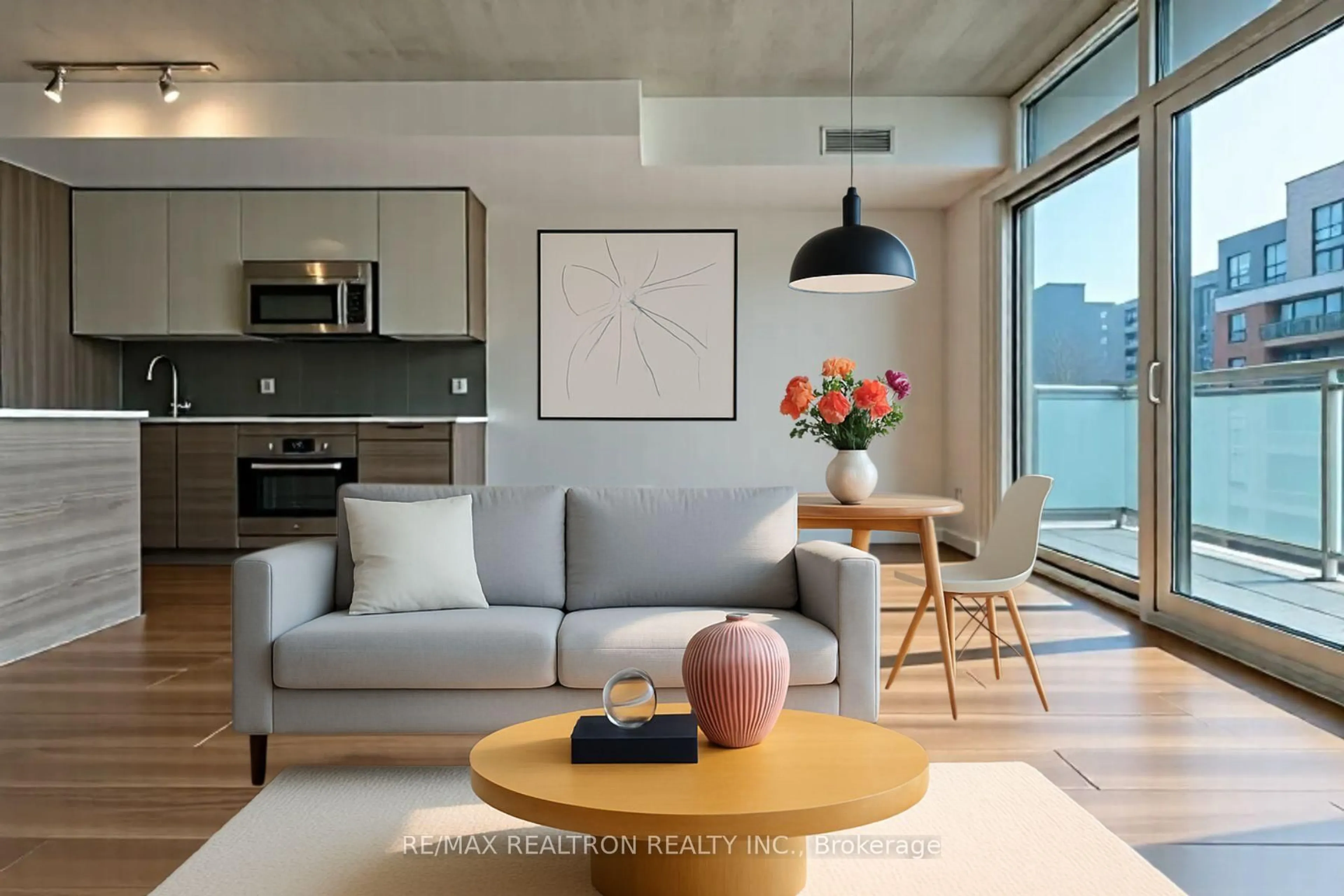 Living room with furniture, cement floor for 210 Simcoe St #704, Toronto Ontario M5T 1T4
