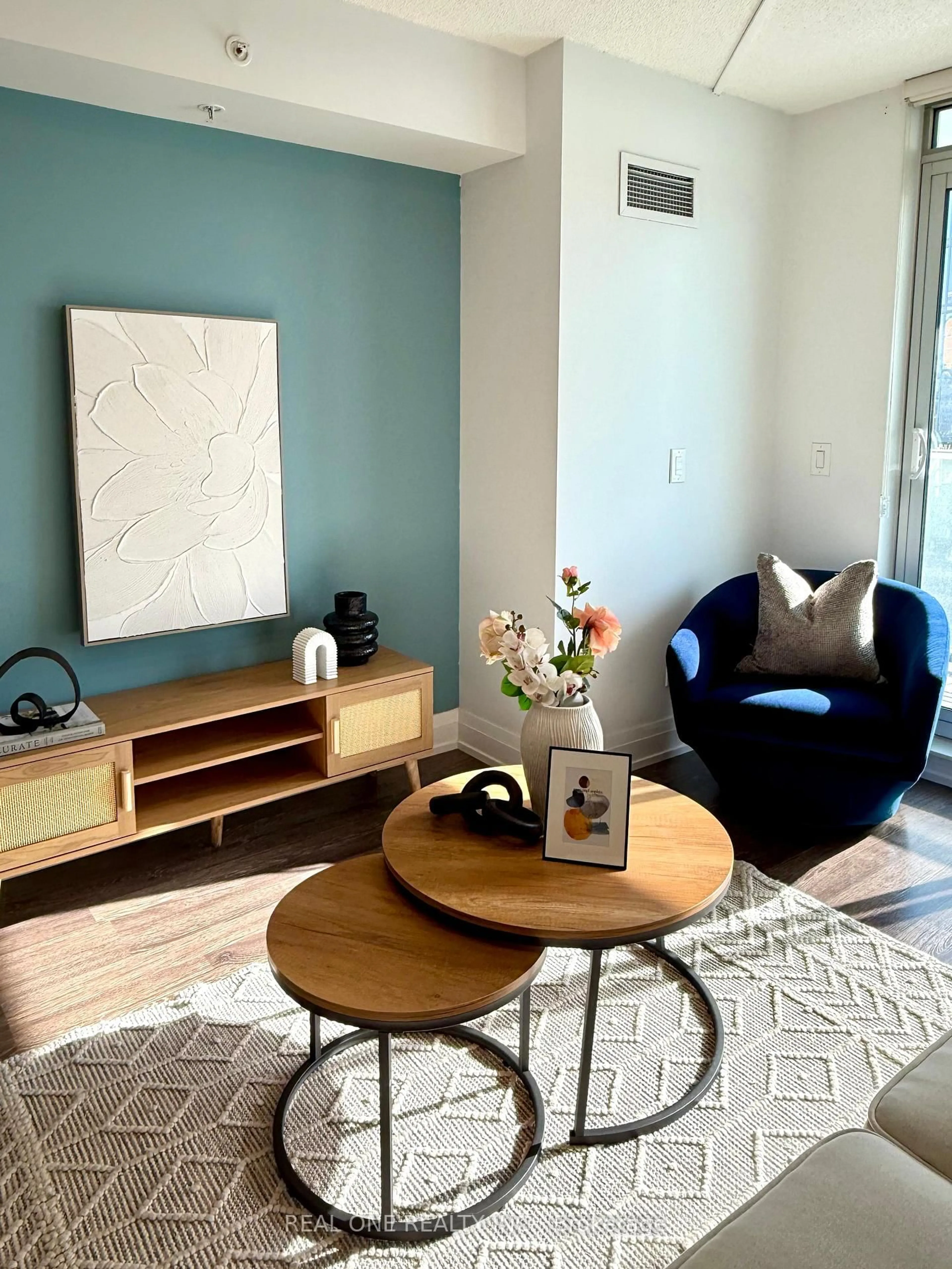 Living room with furniture, wood/laminate floor for 565 Wilson Ave #904W, Toronto Ontario M3H 0C5