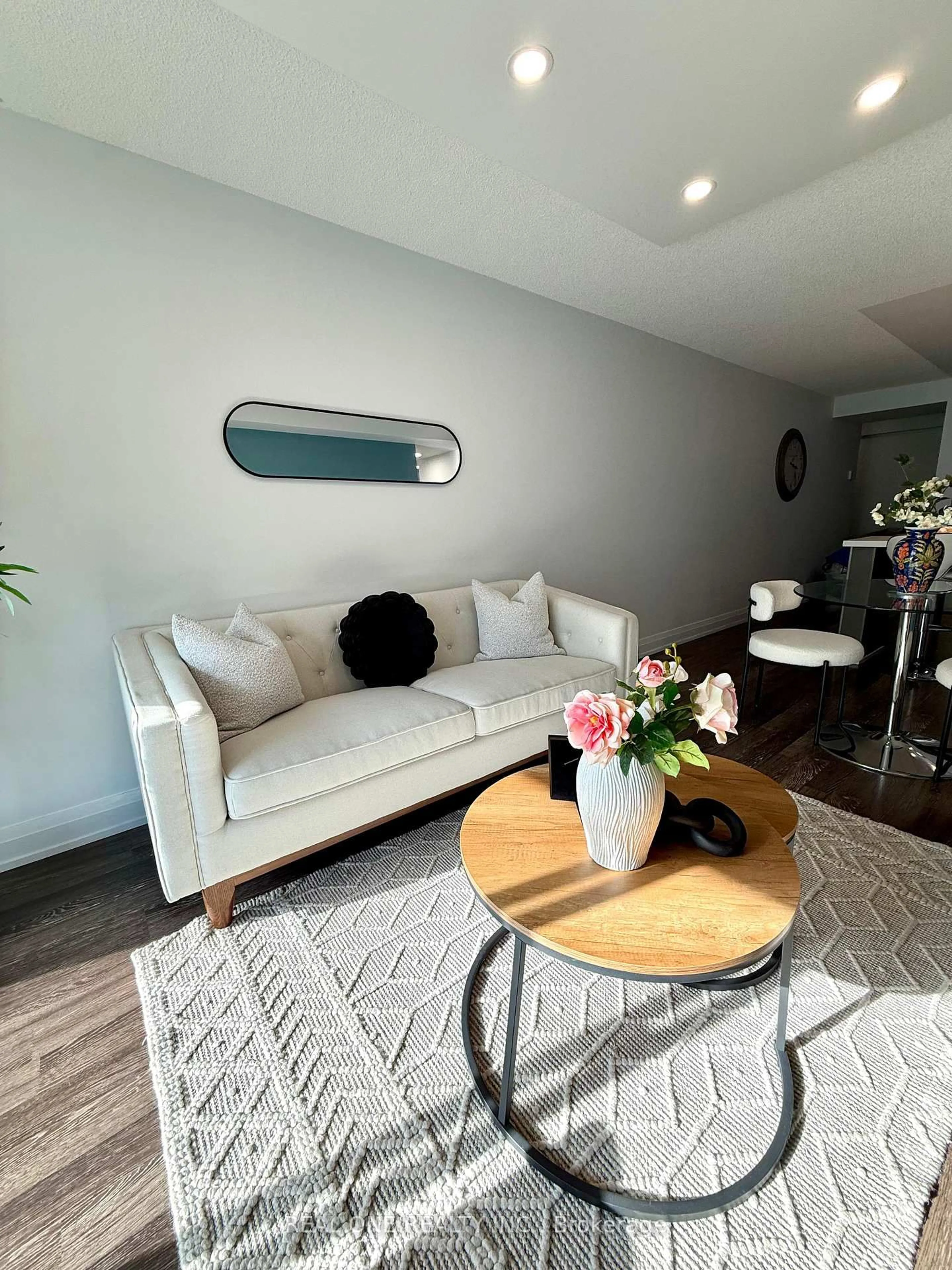 Living room with furniture, wood/laminate floor for 565 Wilson Ave #904W, Toronto Ontario M3H 0C5