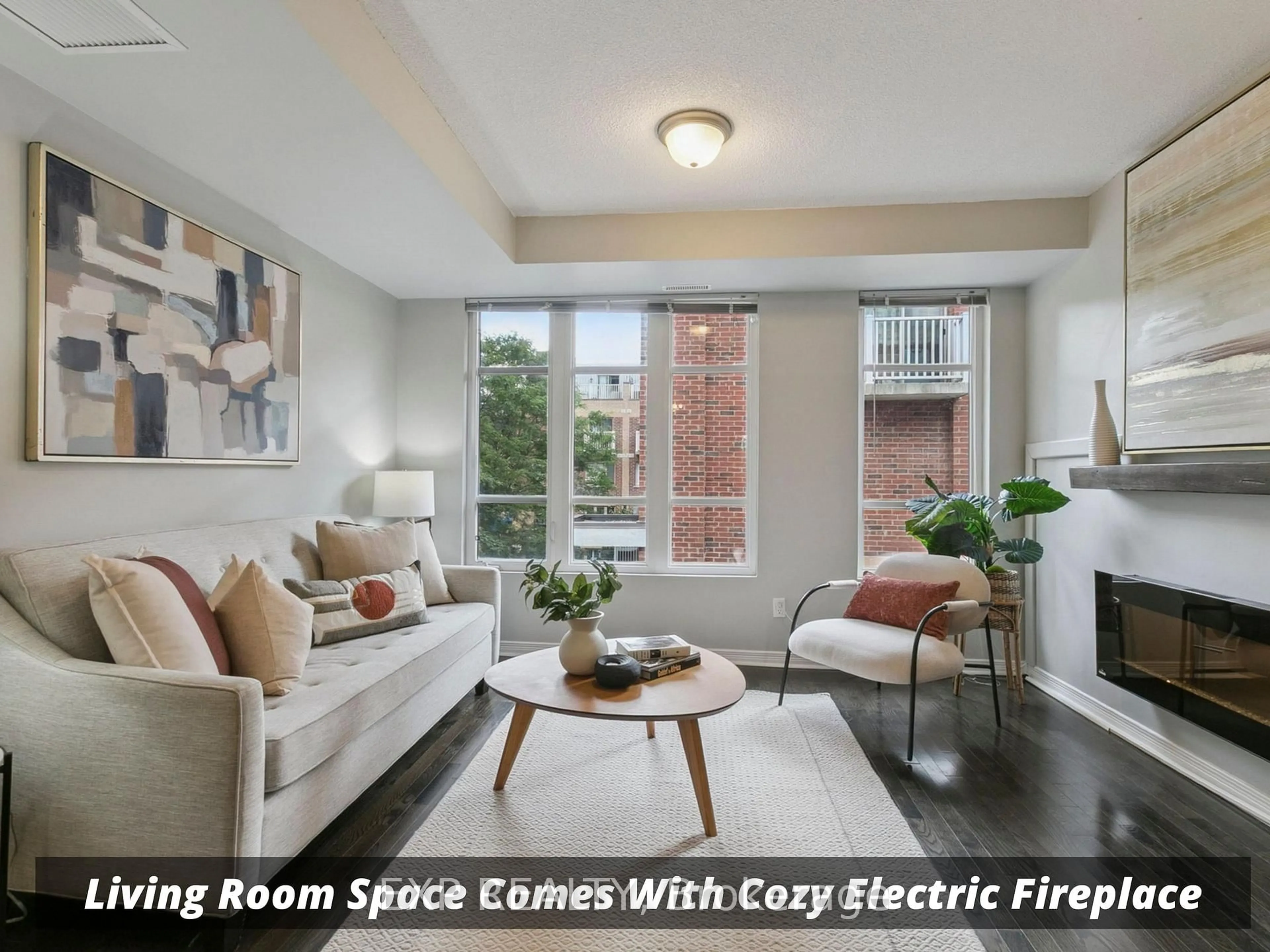 Living room with furniture, carpet floor for 21 Ruttan St #242, Toronto Ontario M6P 0A1