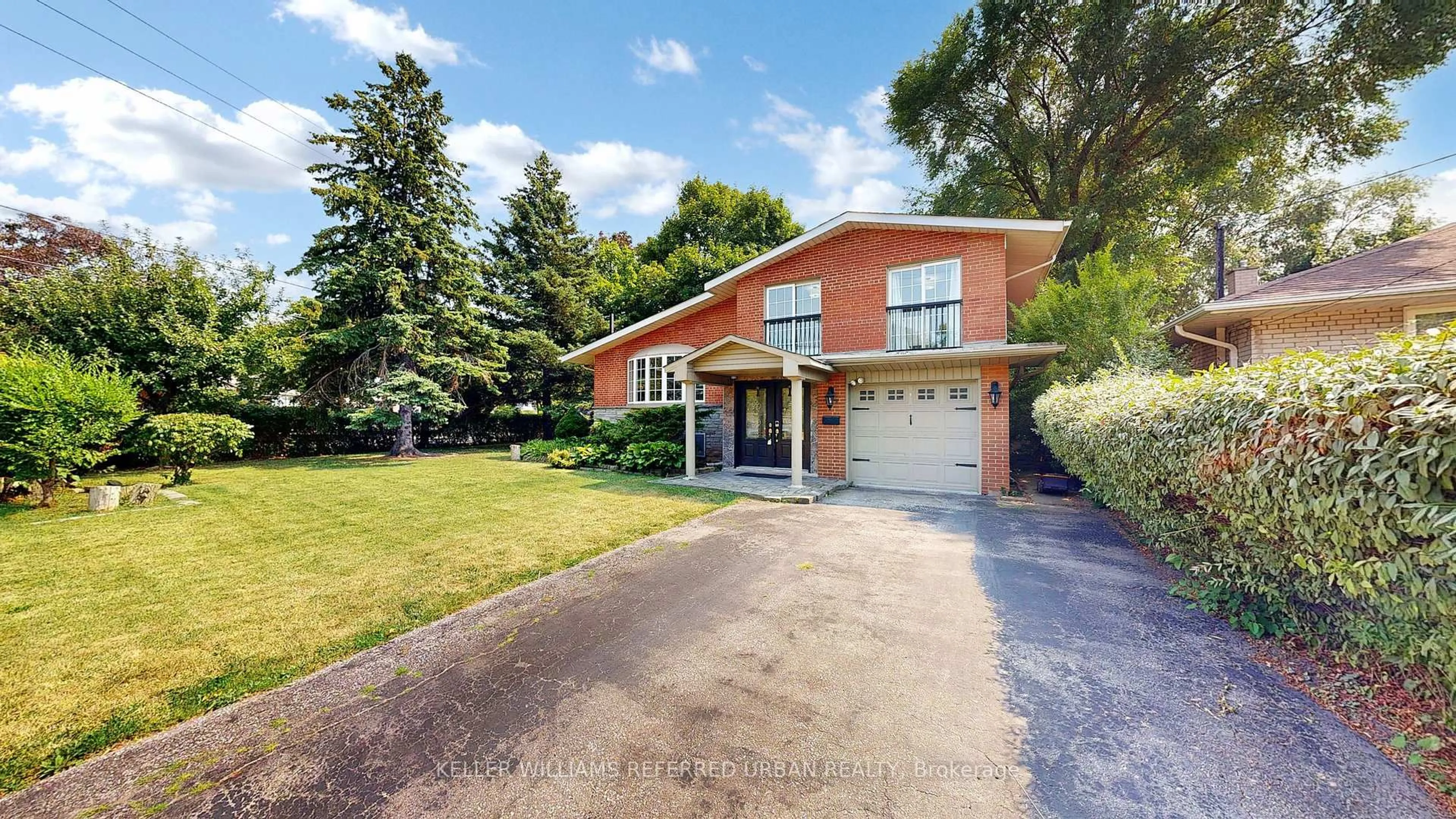 Home with brick exterior material, street for 129 Wyndcliff Cres, Toronto Ontario M4A 2J9