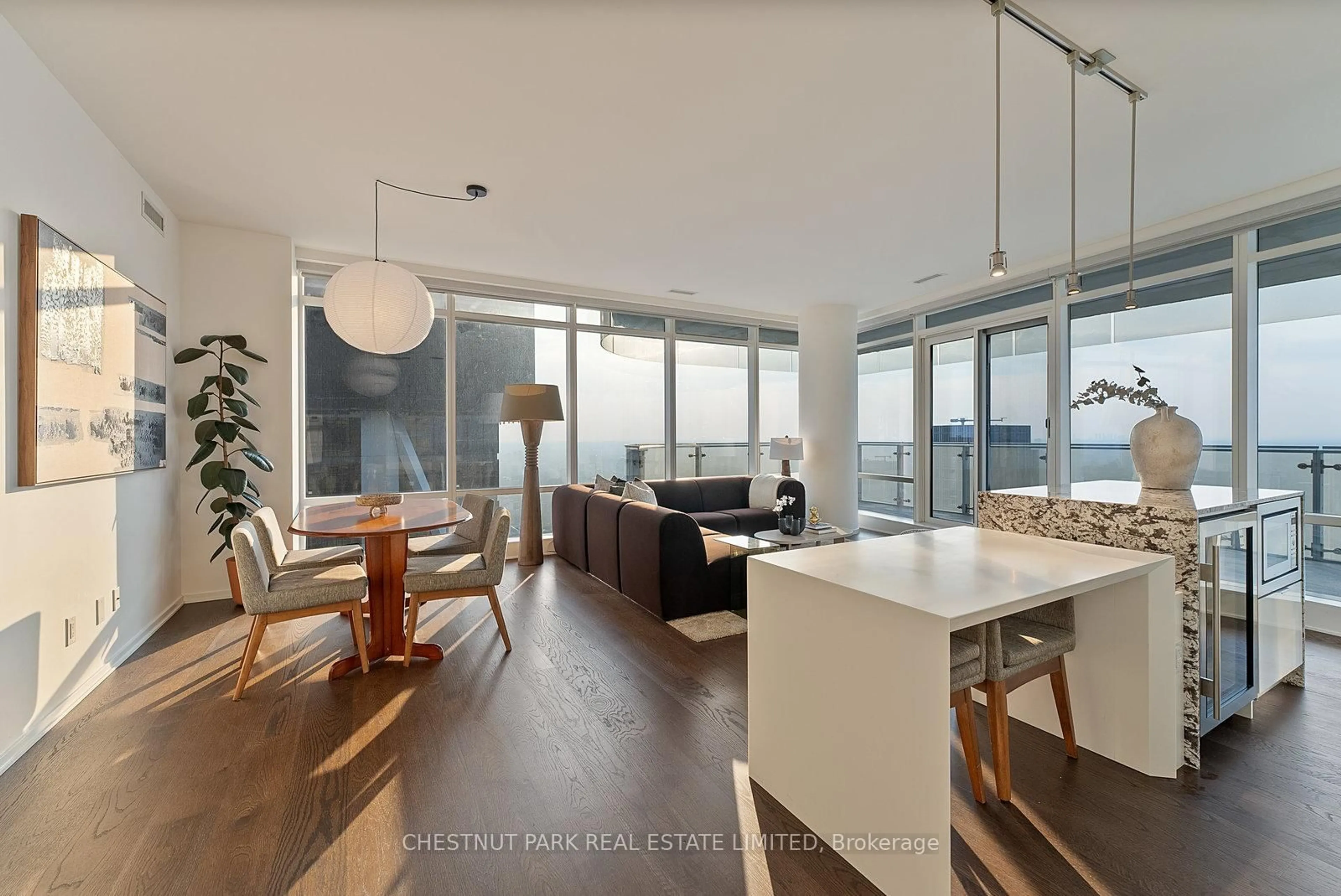 Open concept kitchen, wood/laminate floor for 1 Bloor St #7006, Toronto Ontario M4W 0A8