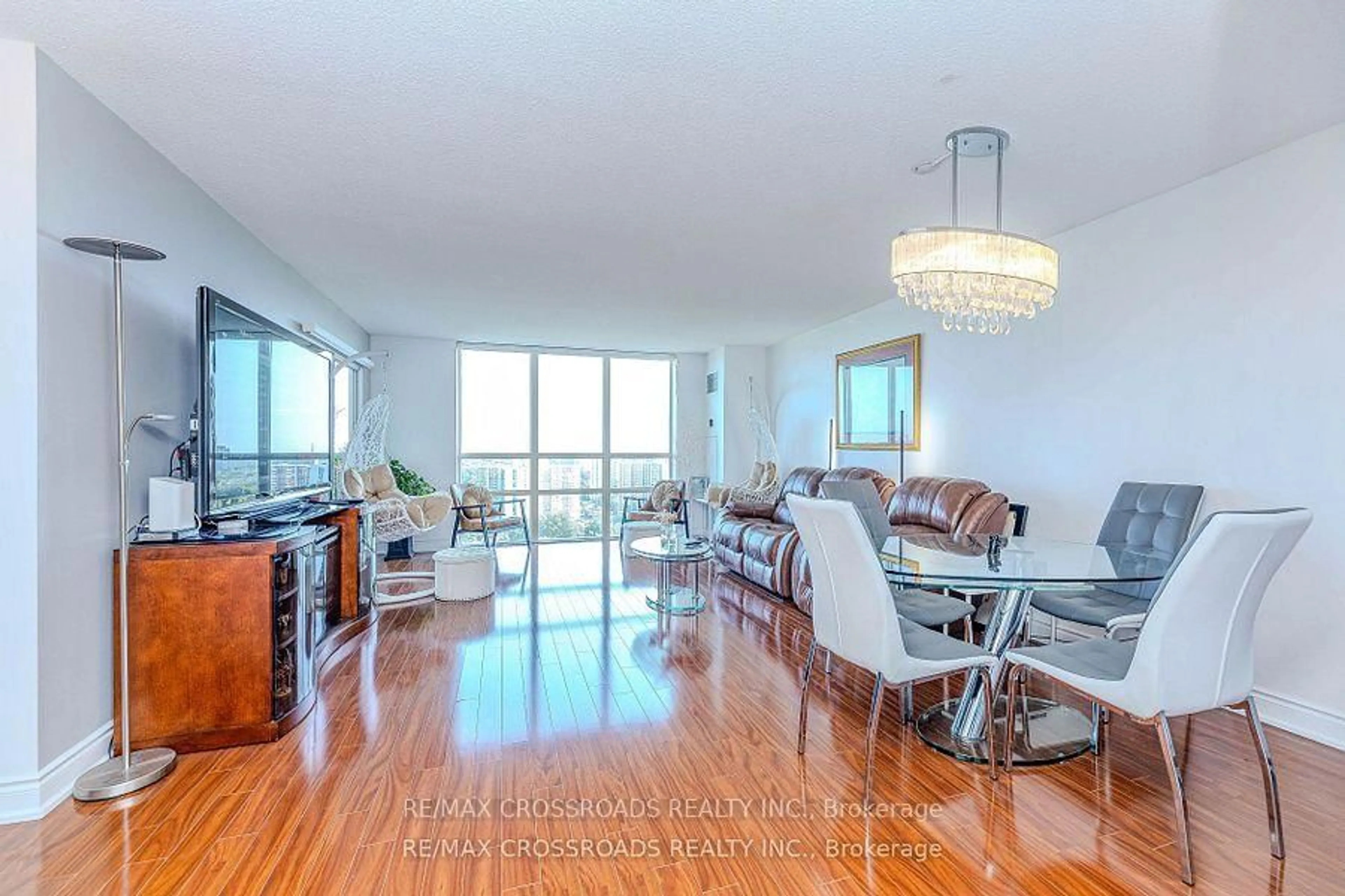 Living room with furniture, wood/laminate floor for 205 Wynford Dr #2004, Toronto Ontario M3C 3P4