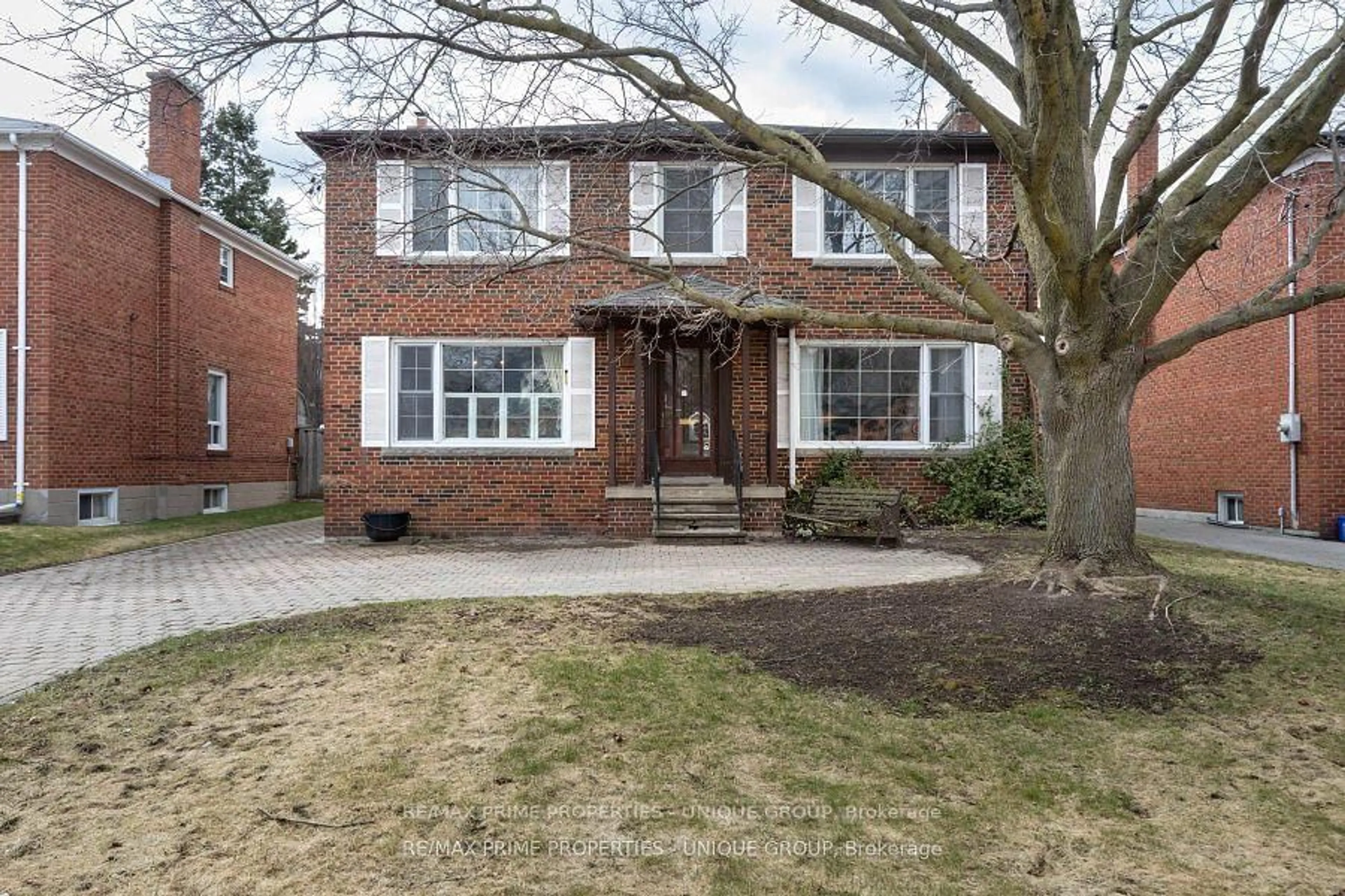 Home with brick exterior material, street for 173 Ridley Blvd, Toronto Ontario M5M 3M4