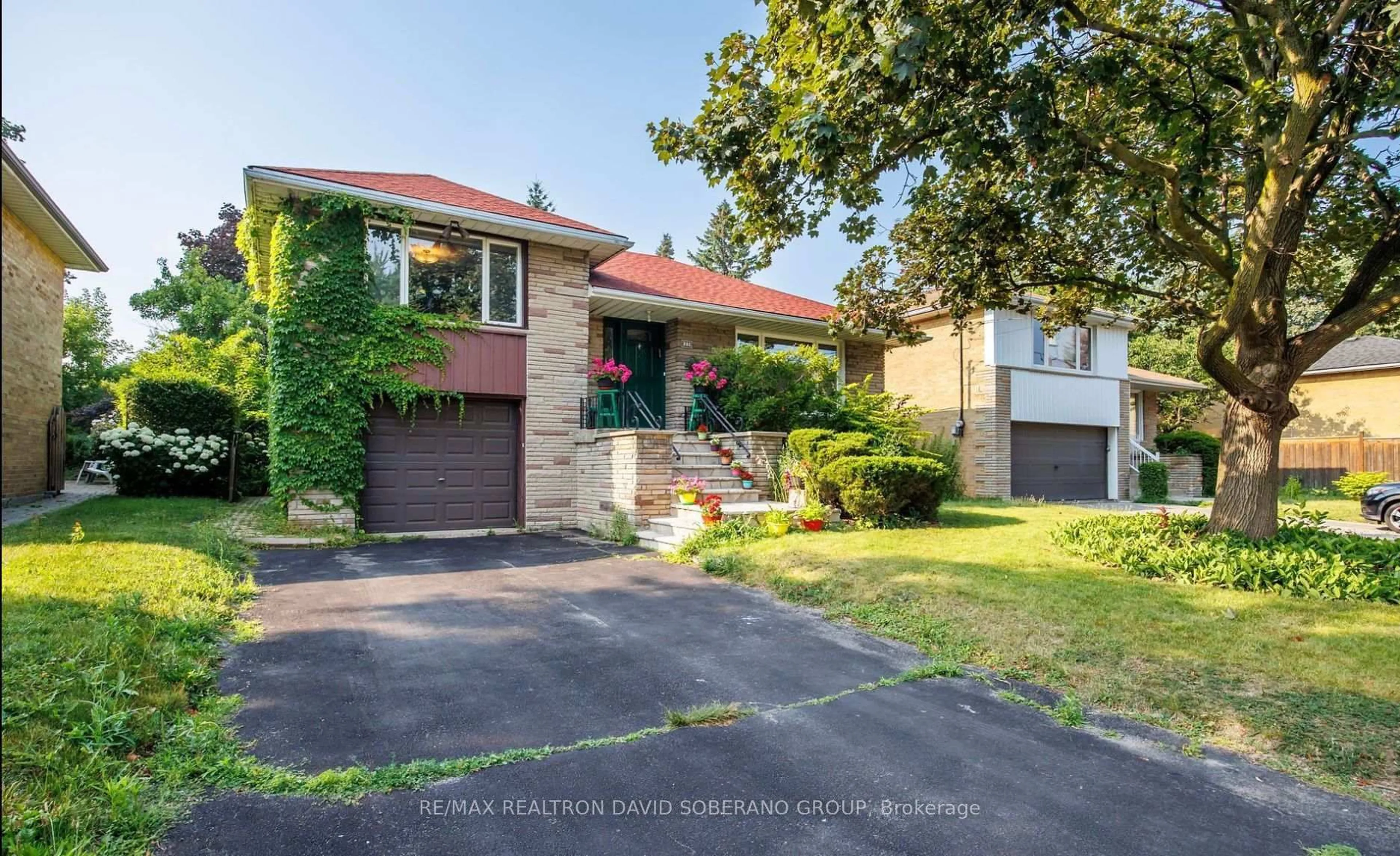 Home with brick exterior material, street for 29 Artreeva Dr, Toronto Ontario M3H 4T7