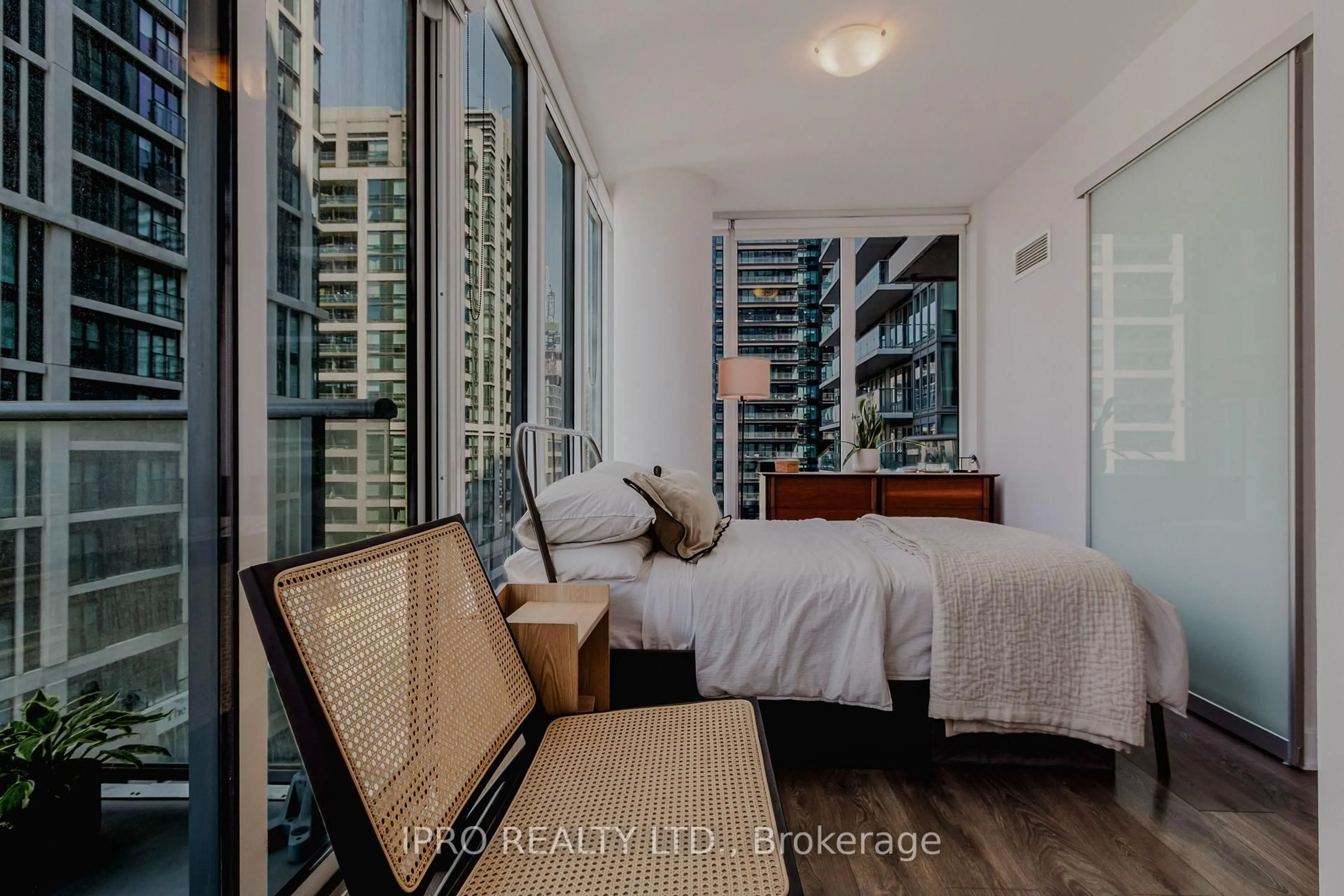 Bedroom with bed, wood/laminate floor for 195 Redpath Ave, Toronto Ontario M4P 0E4