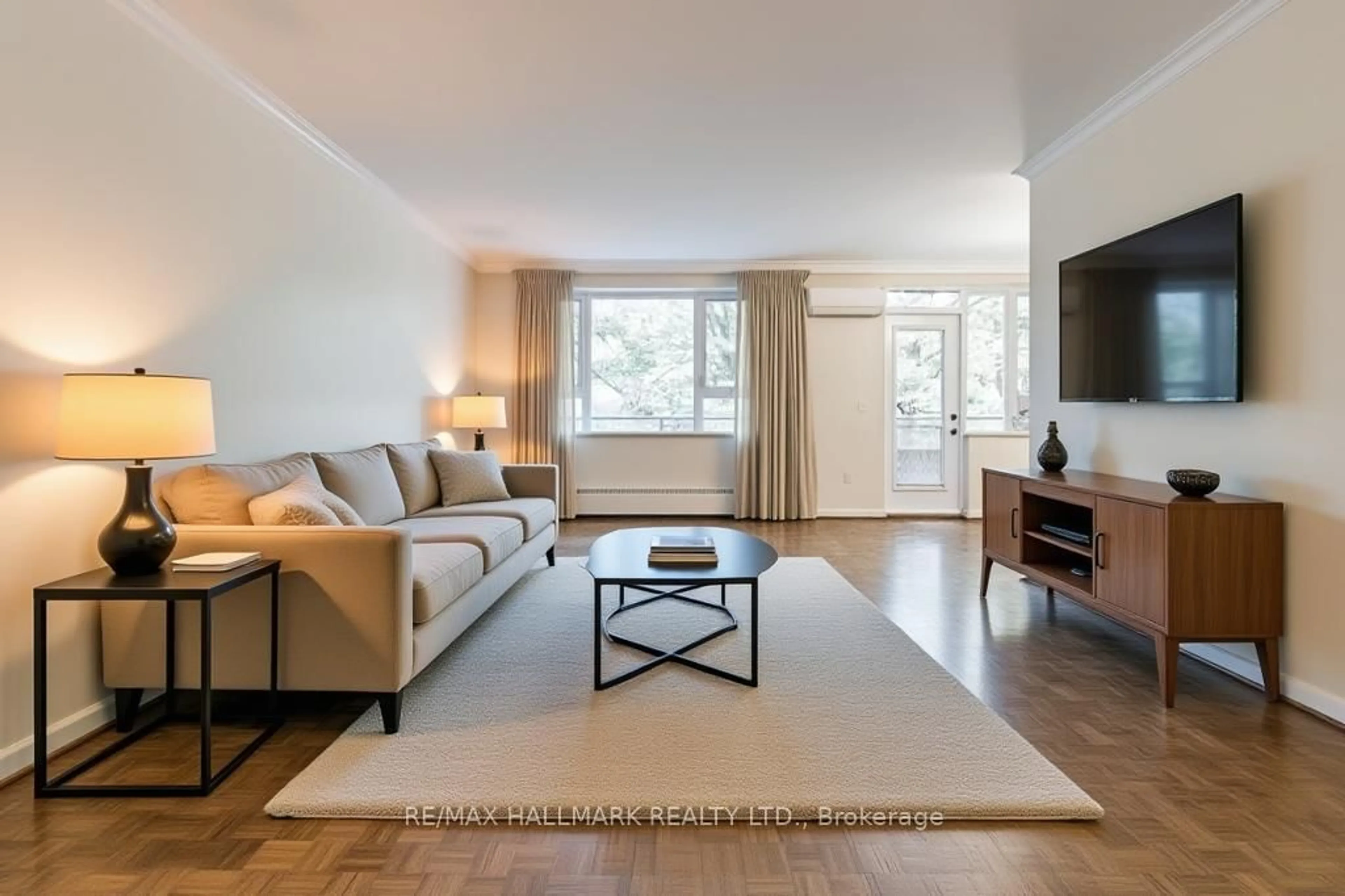 Living room with furniture, unknown for 40 Glen Rd #209, Toronto Ontario M4W 2V1