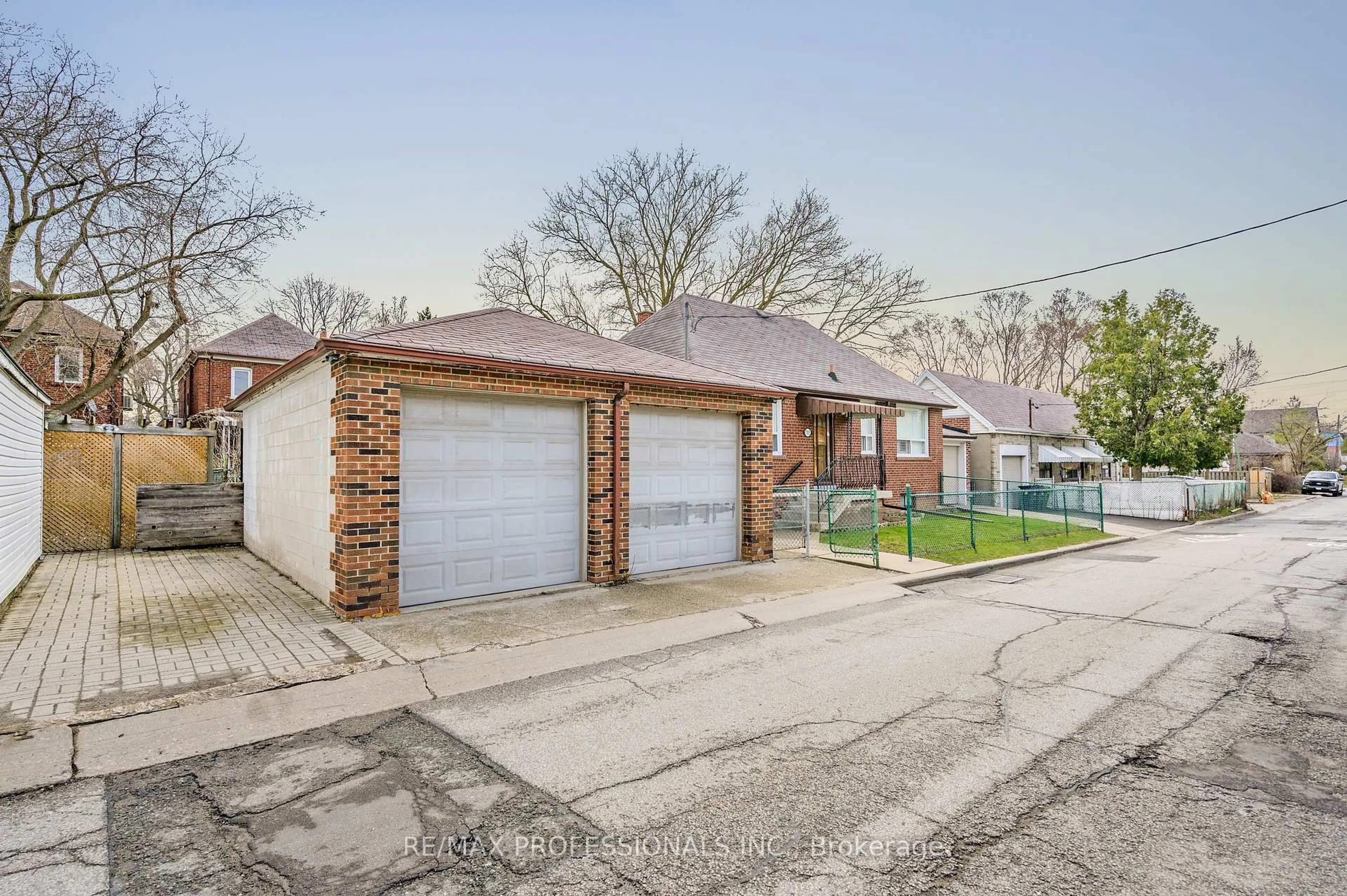 Home with brick exterior material, street for 560 Atlas Ave, Toronto Ontario M6C 3R4
