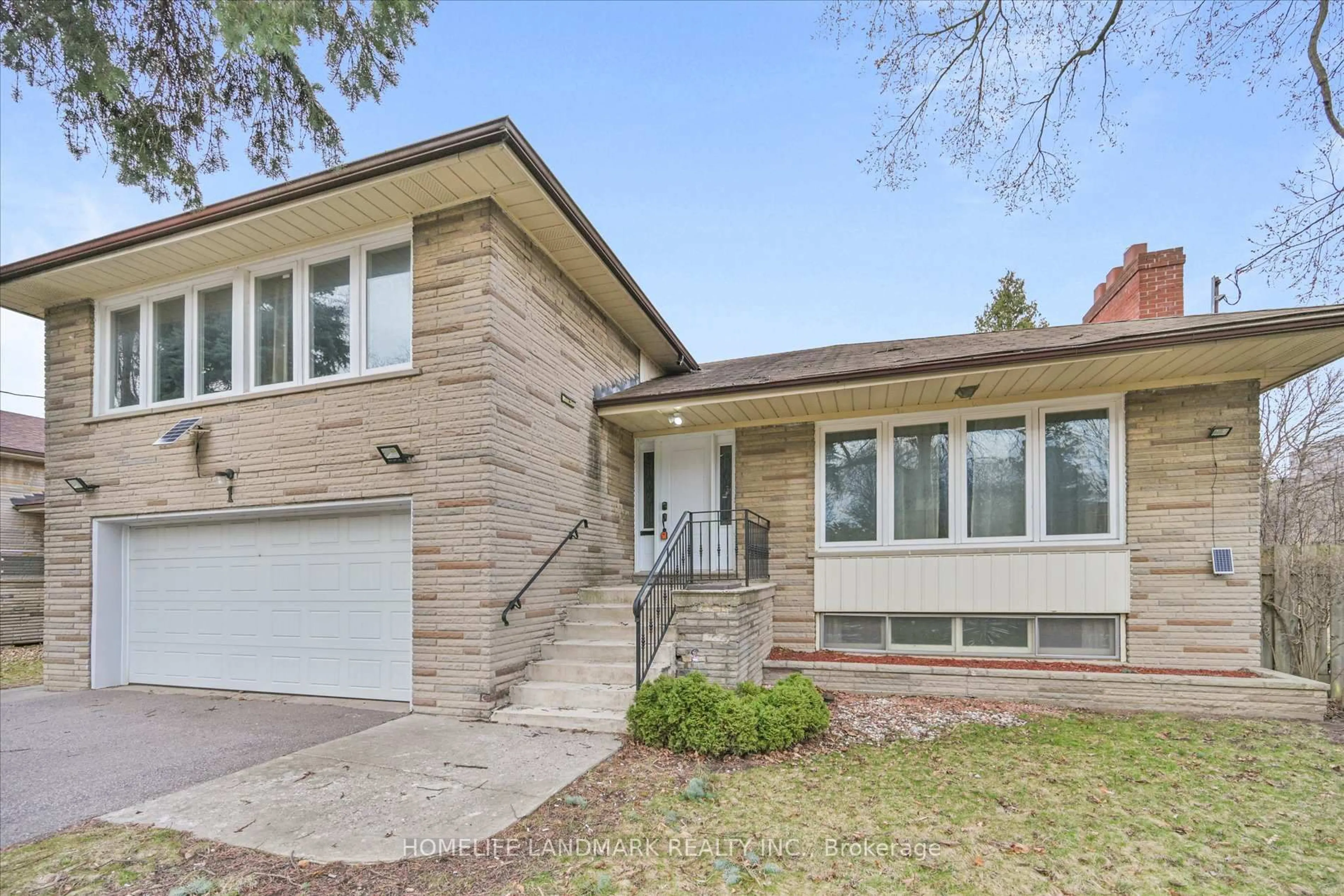 Home with brick exterior material, street for 1 Hawksbury Dr, Toronto Ontario M2K 1M2