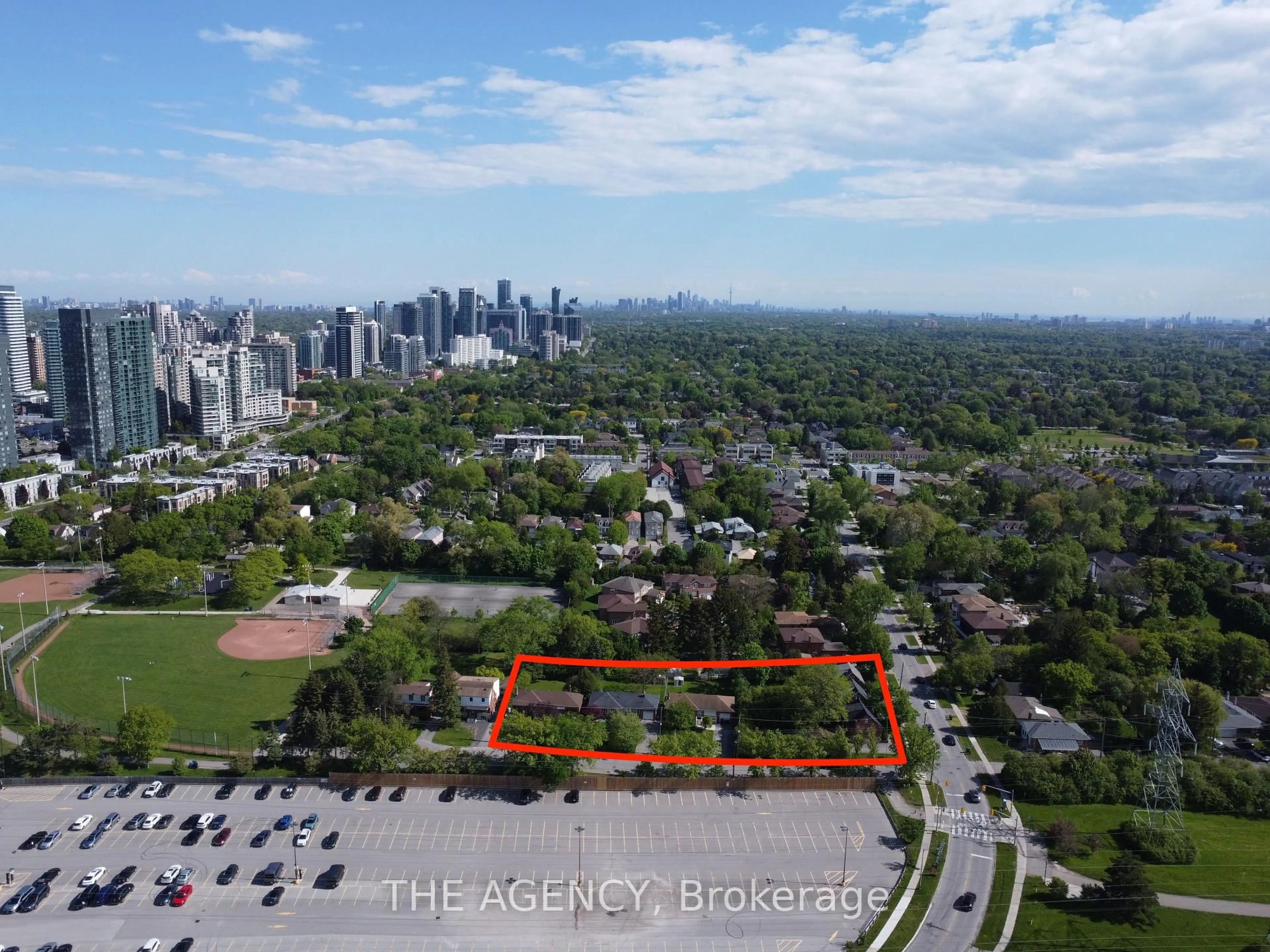 A pic from outside/outdoor area/front of a property/back of a property/a pic from drone, city buildings view from balcony for 75 Talbot Rd, Toronto Ontario M2M 1S1