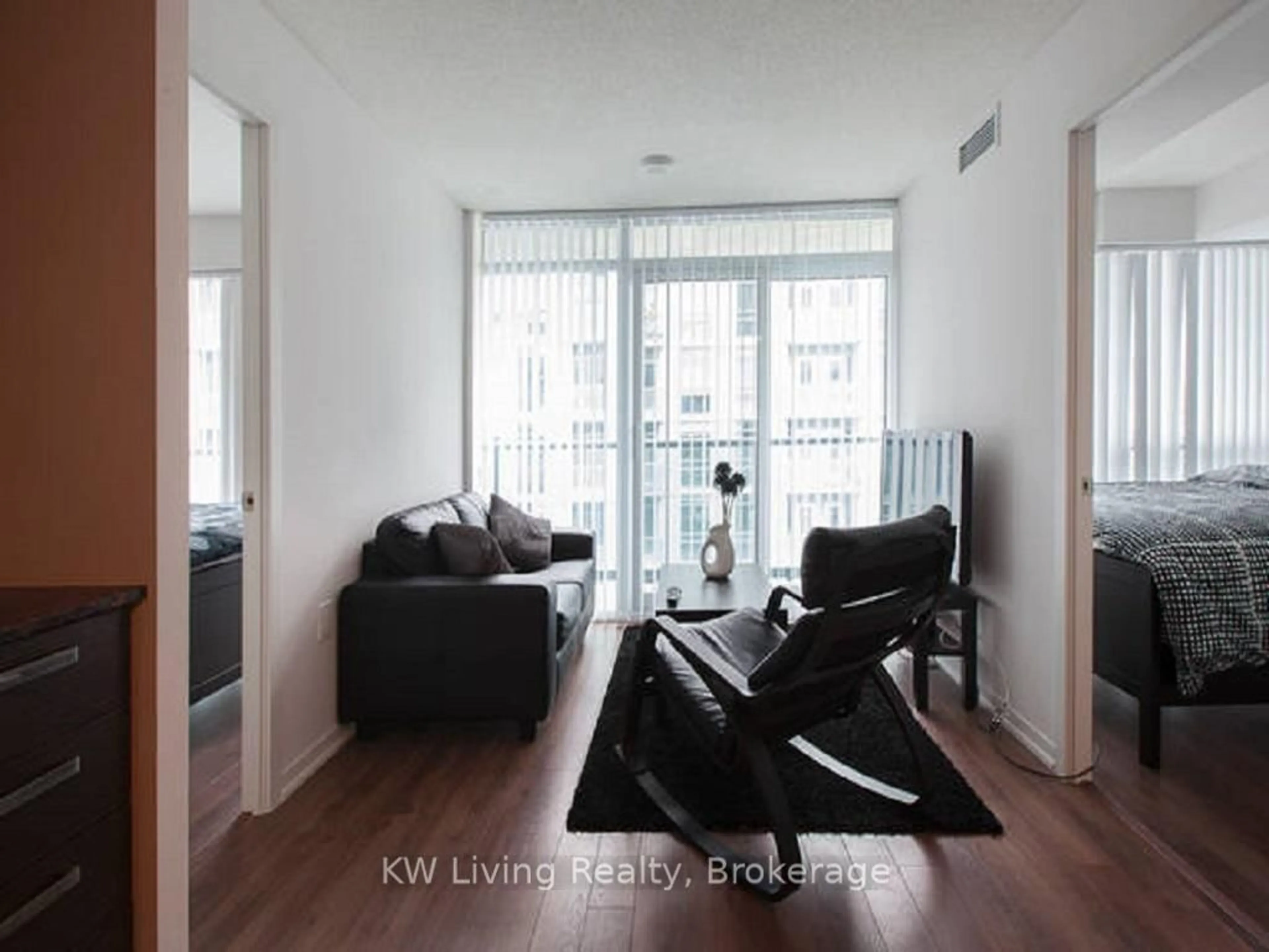 Living room with furniture, wood/laminate floor for 36 Lisgar St #1602, Toronto Ontario M6J 0C7