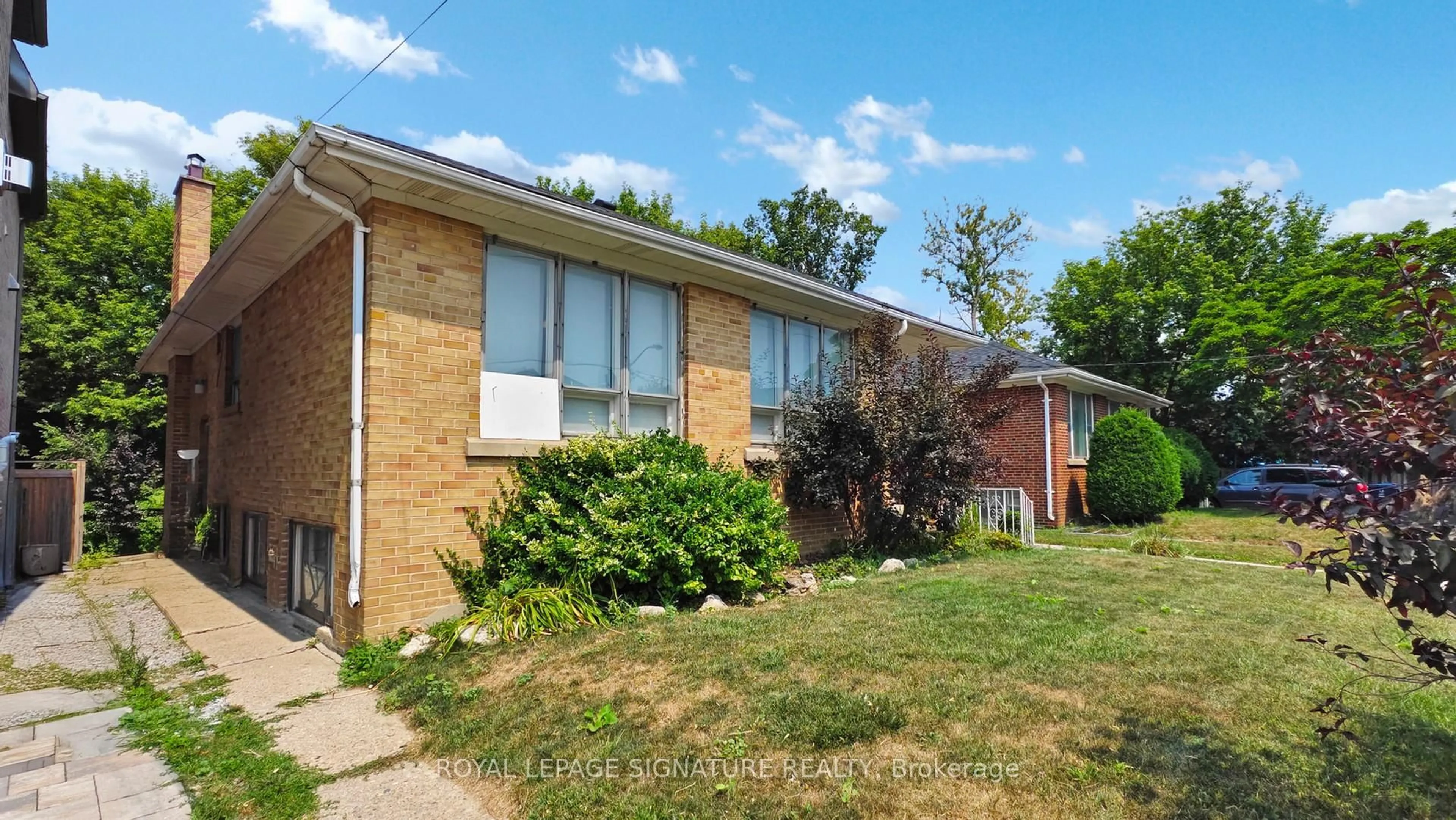 Home with brick exterior material, street for 174 Caribou Rd, Toronto Ontario M5N 2B6