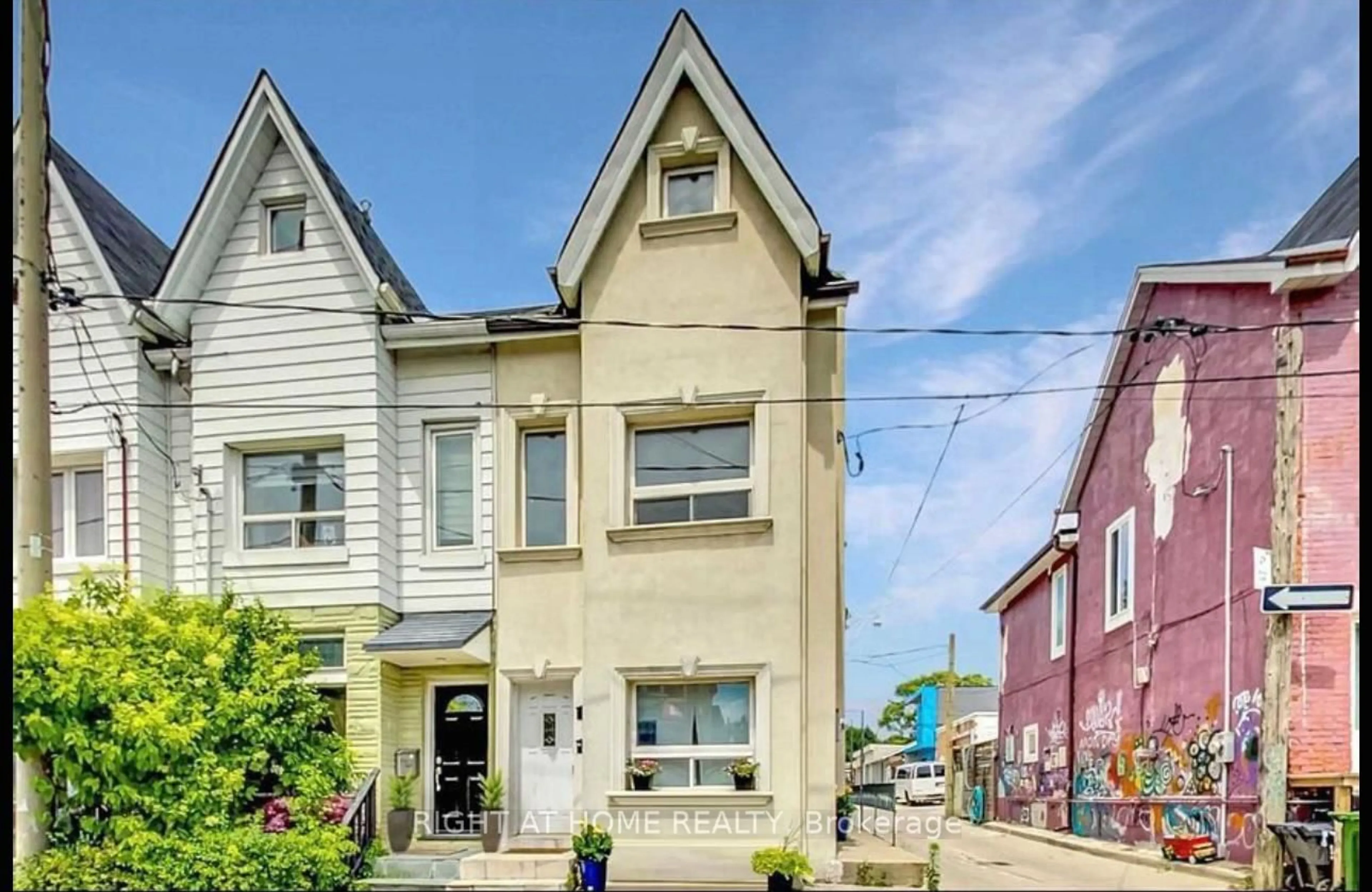 Home with vinyl exterior material, street for 50 Shirley St, Toronto Ontario M6K 1T1