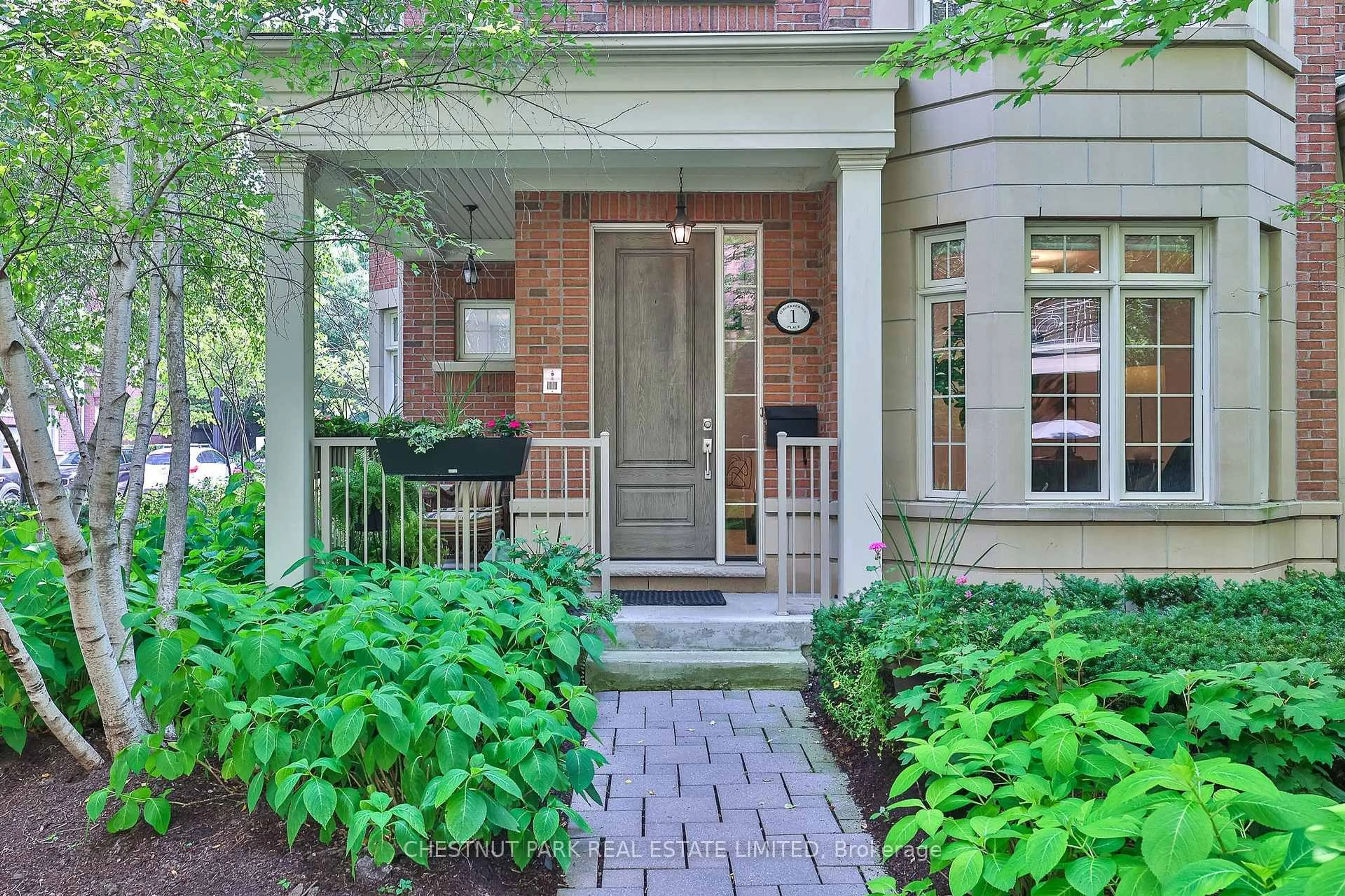 Home with brick exterior material, street for 12 Burkebrook Pl #1, Toronto Ontario M4G 0A8