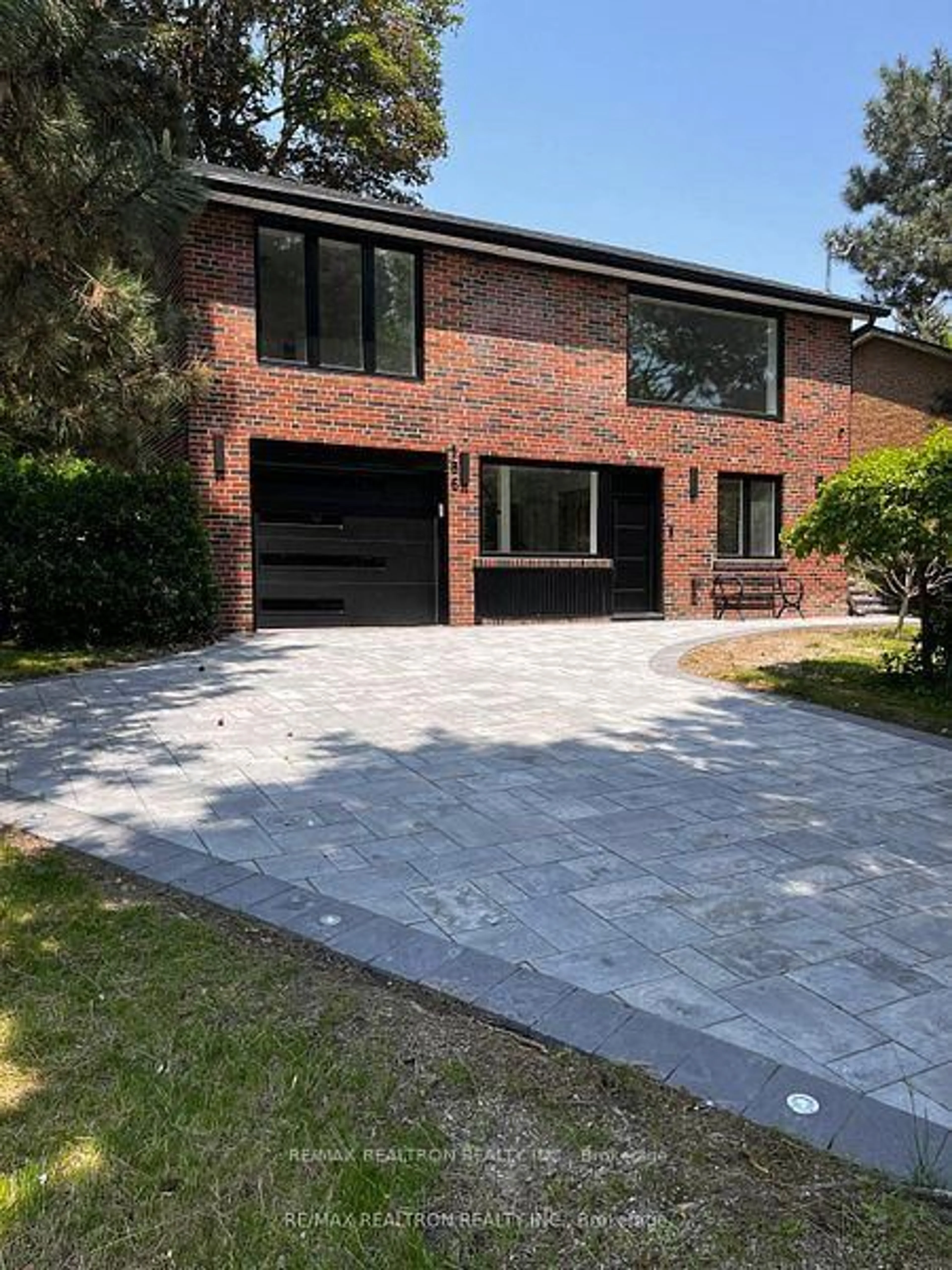 Home with brick exterior material, street for 186 Sweeney Dr, Toronto Ontario M4A 1V4