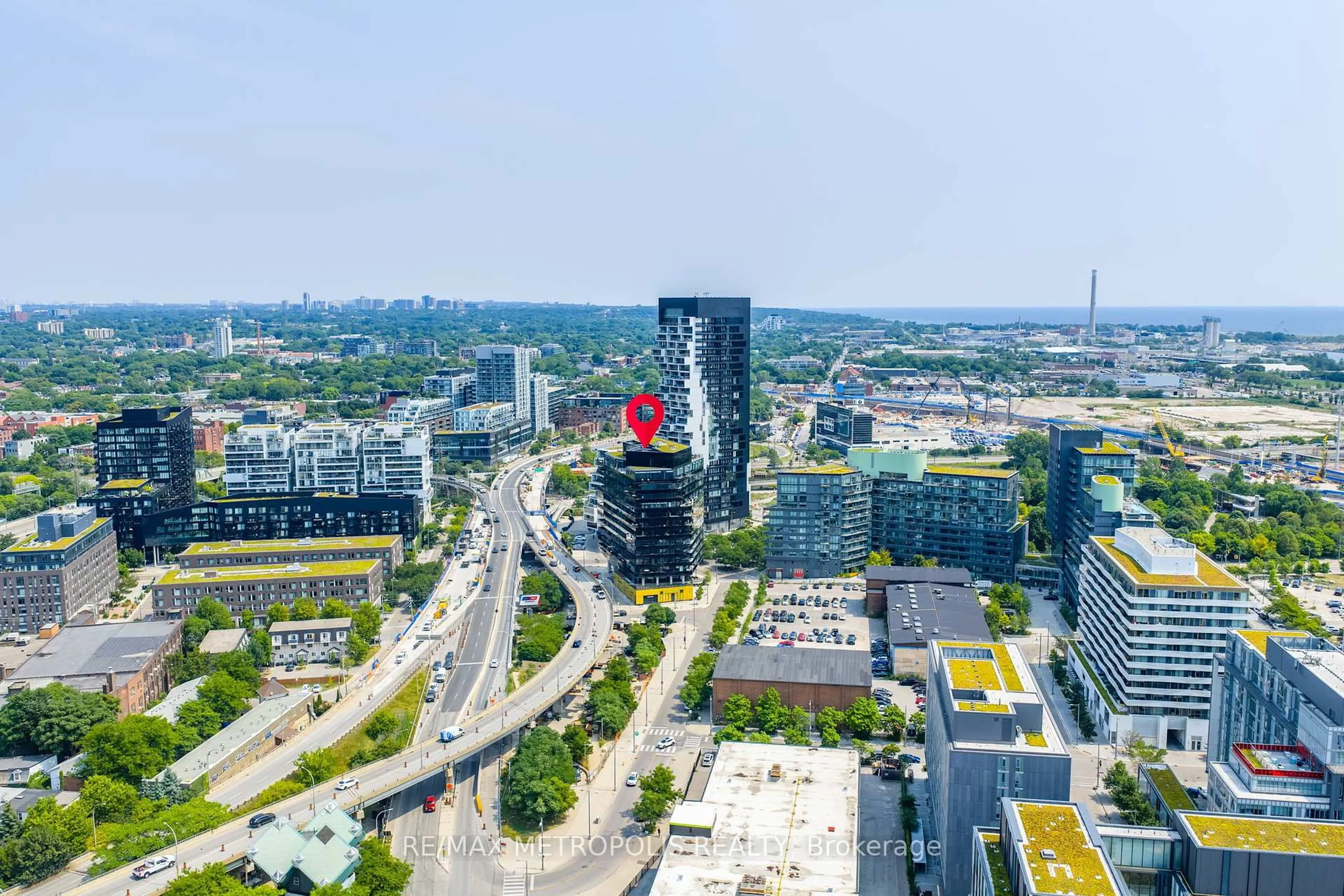 A pic from outside/outdoor area/front of a property/back of a property/a pic from drone, city buildings view from balcony for 21 Lawren Harris Sq #1213, Toronto Ontario M5A 0T4