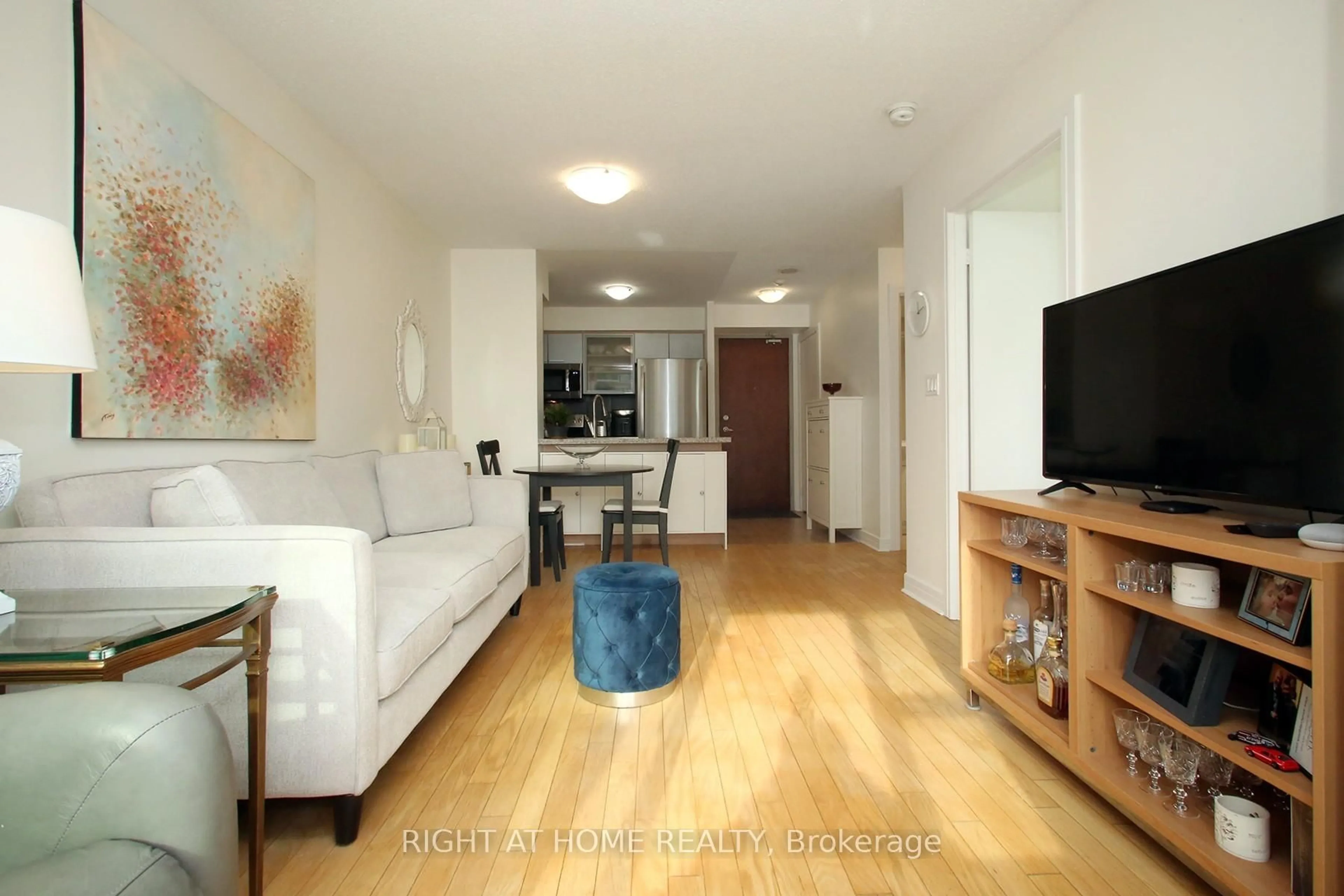 Living room with furniture, wood/laminate floor for 16 Harrison Garden Blvd #1507, Toronto Ontario M2N 7J6