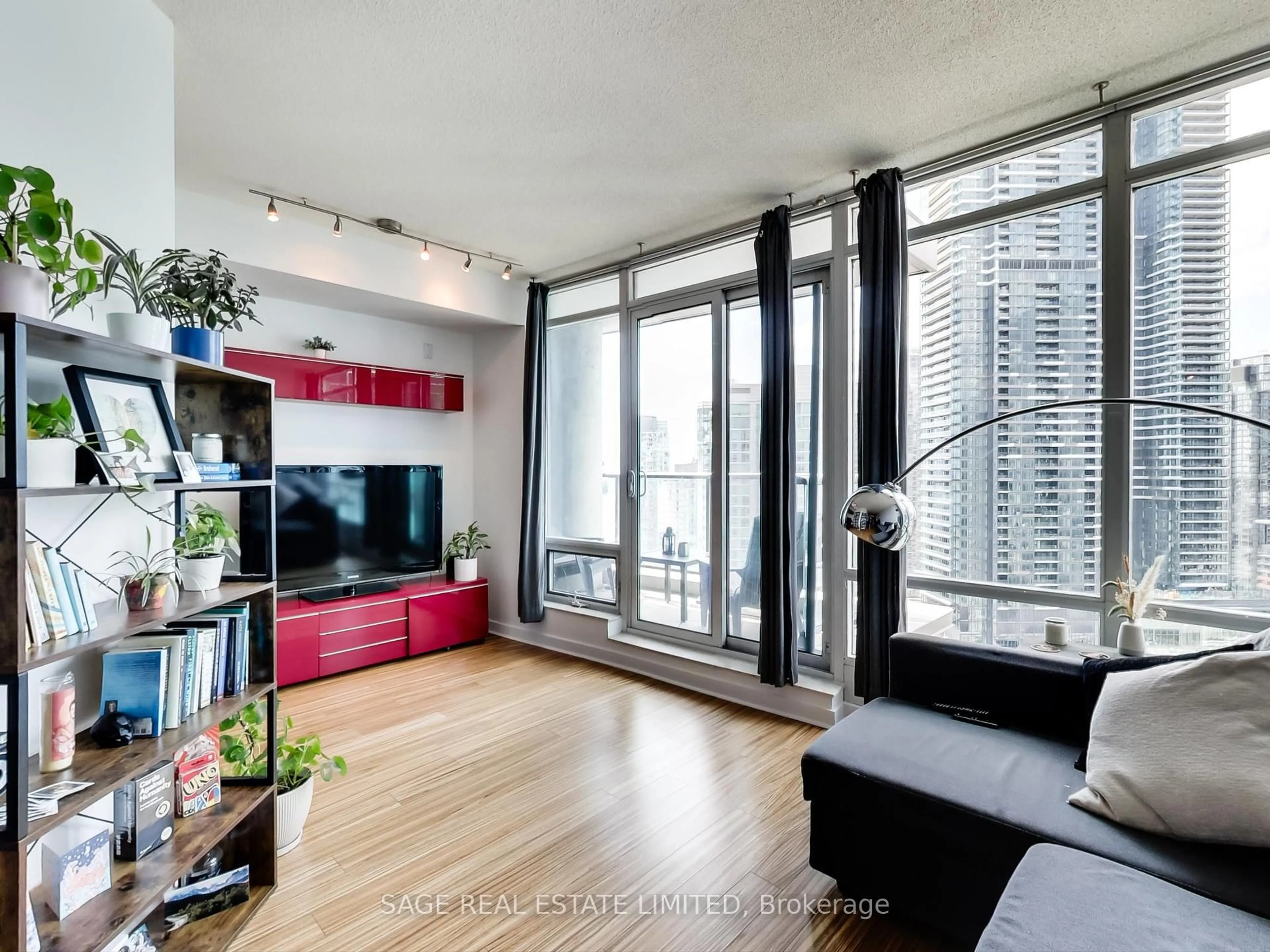 Living room with furniture, wood/laminate floor for 361 Front St #3306, Toronto Ontario M5V 3R5