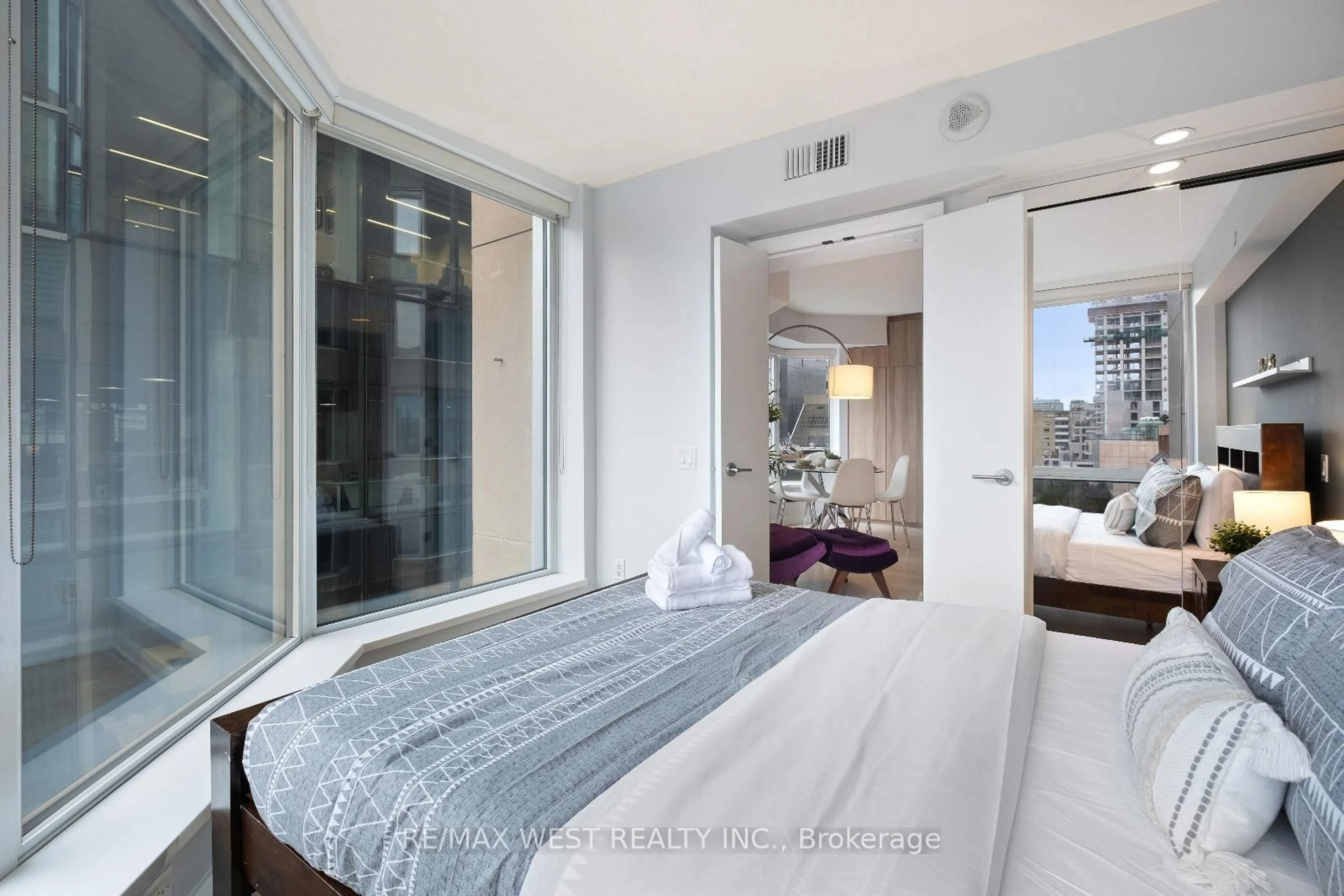 Bedroom with bed, unknown for 155 Yorkville Ave #704, Toronto Ontario M5R 0B4