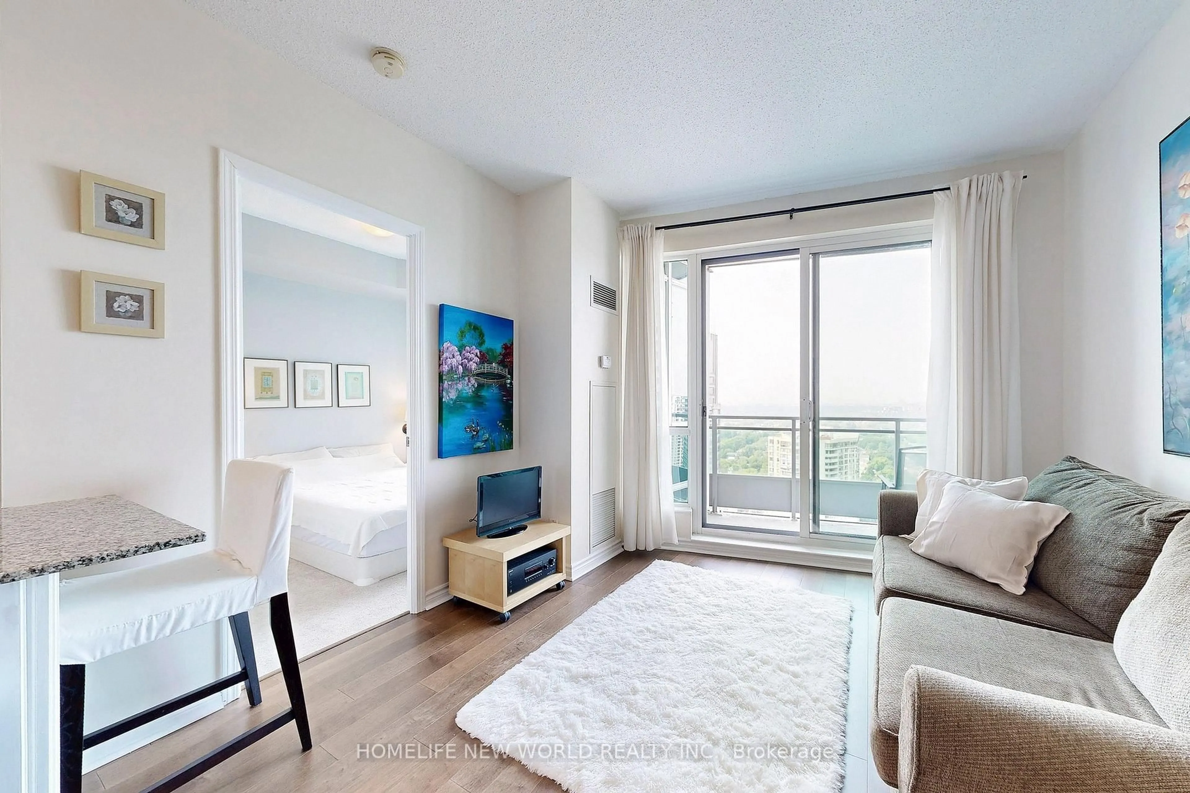 Living room with furniture, wood/laminate floor for 60 Byng Ave #2512, Toronto Ontario M2N 4K3