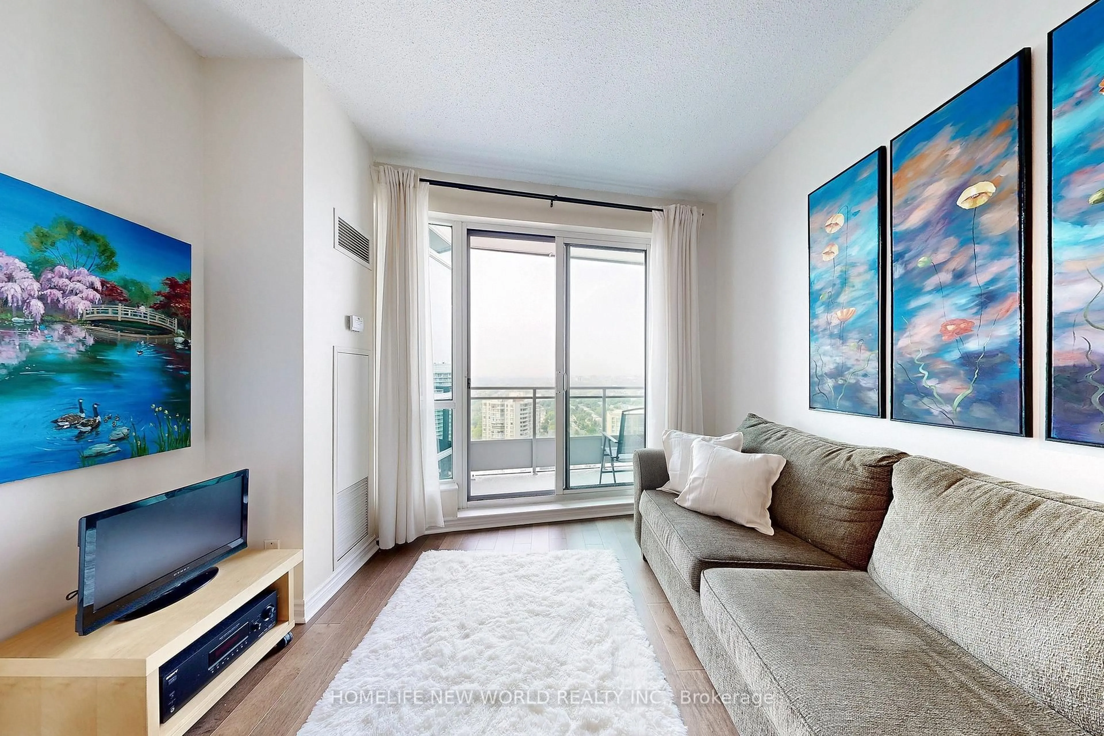 Living room with furniture, wood/laminate floor for 60 Byng Ave #2512, Toronto Ontario M2N 4K3