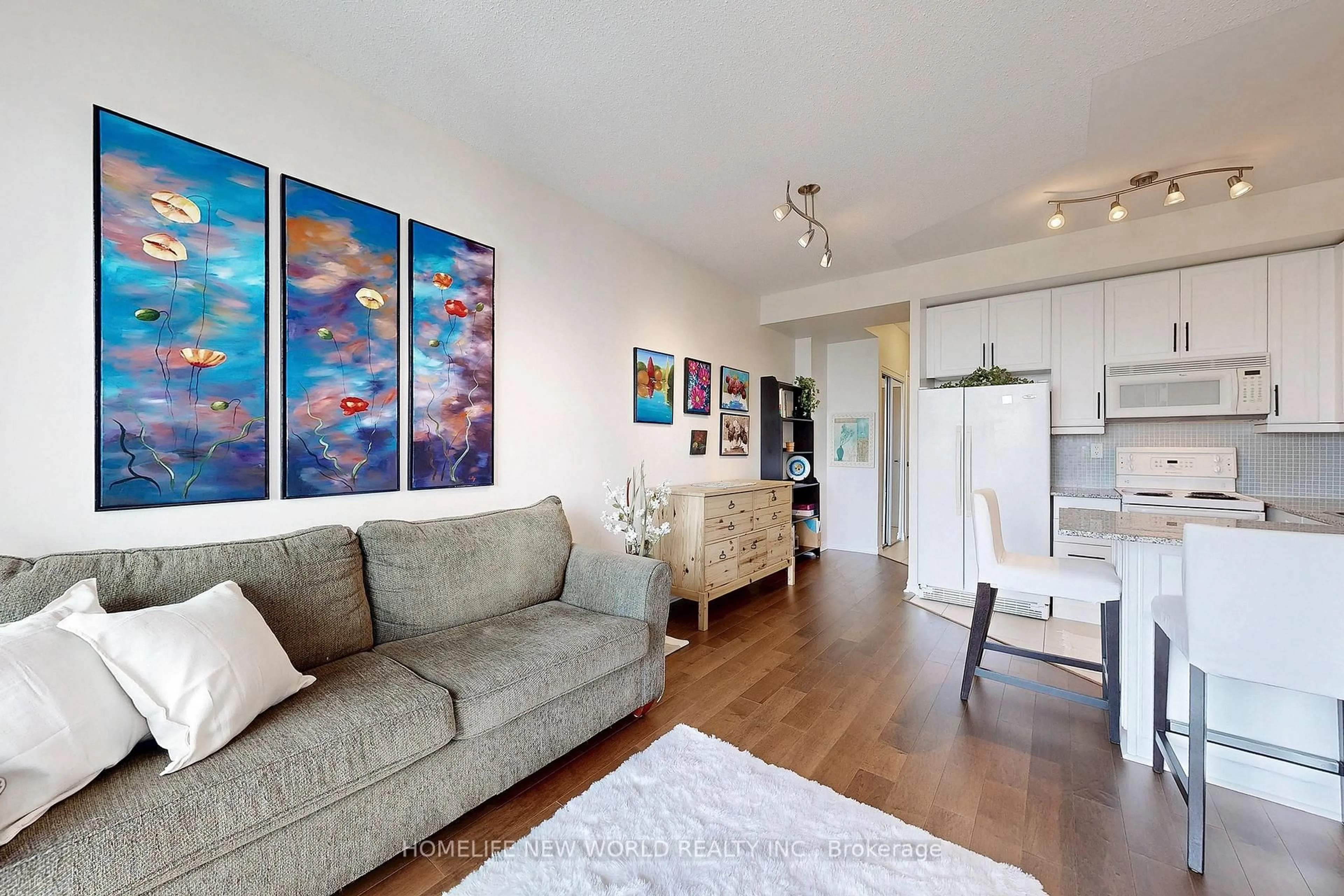 Living room with furniture, wood/laminate floor for 60 Byng Ave #2512, Toronto Ontario M2N 4K3