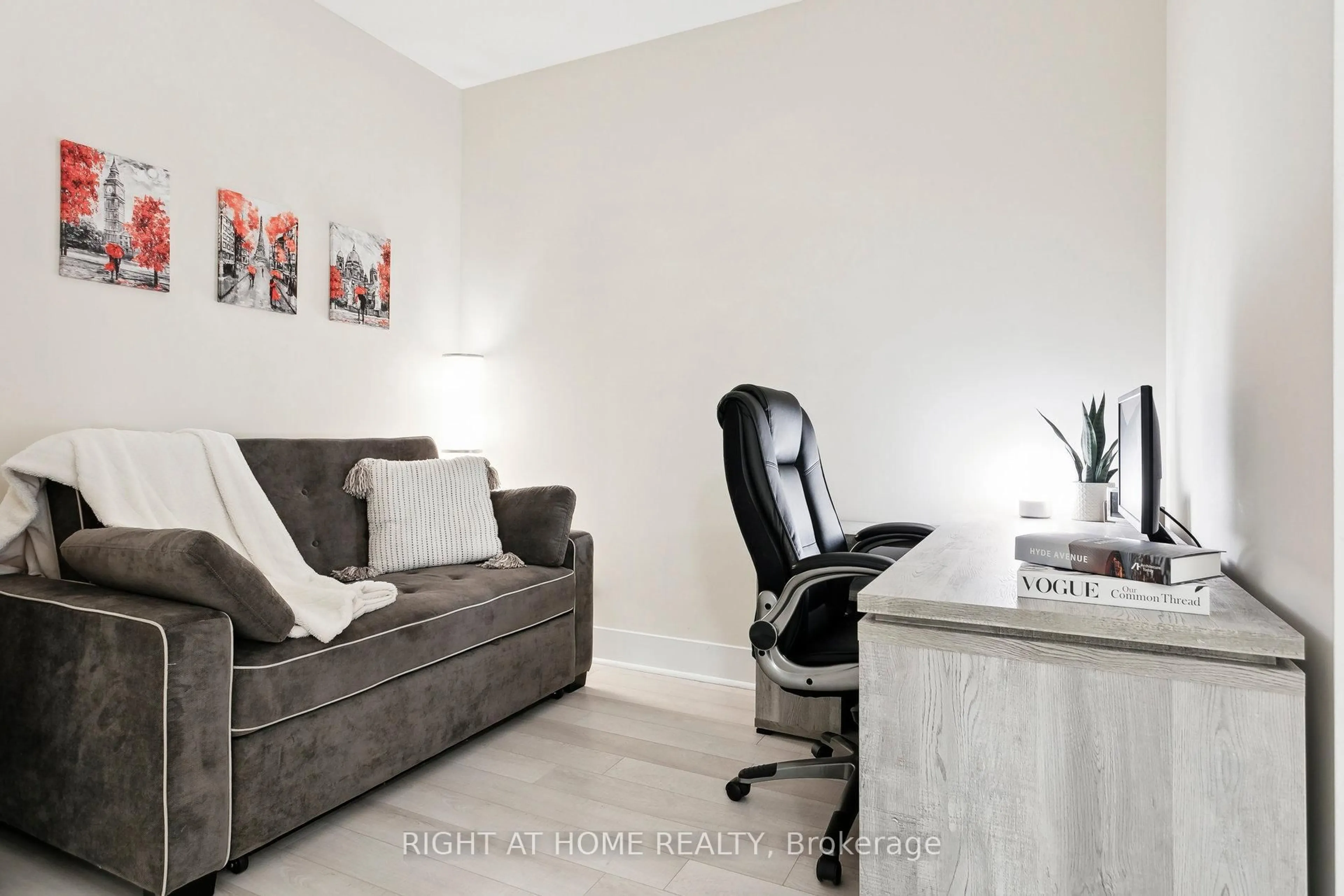 Living room with furniture, wood/laminate floor for 32 Davenport Rd #311, Toronto Ontario M5R 1H3