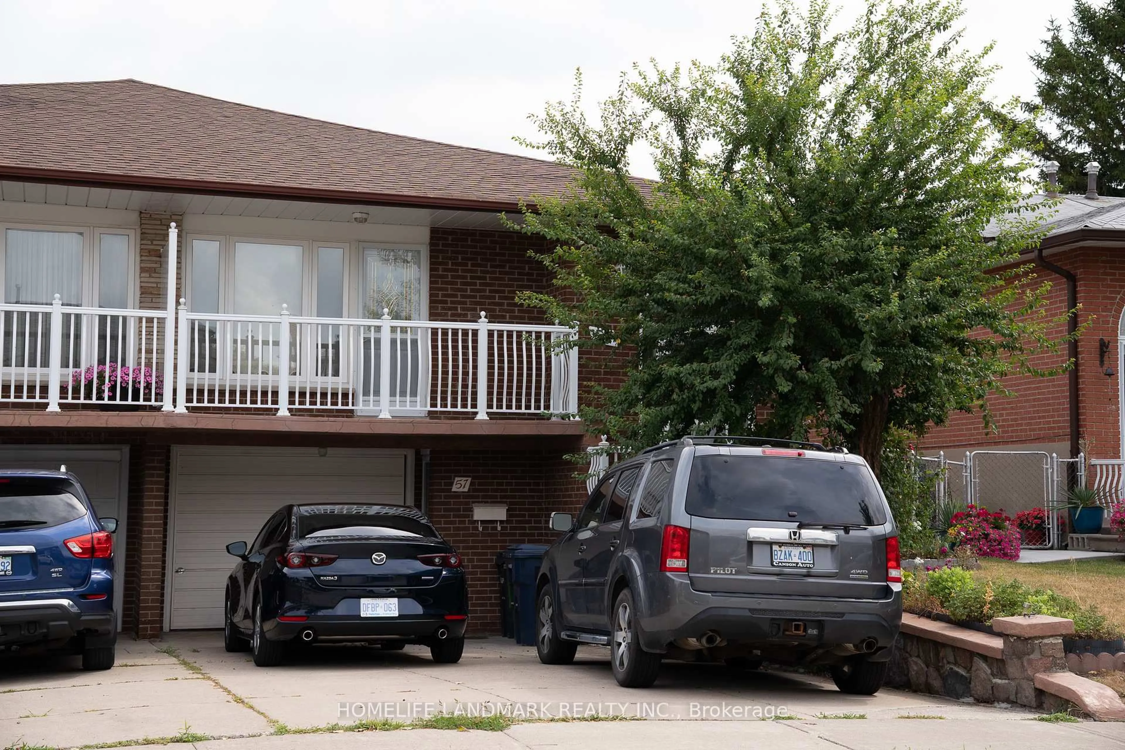 Home with vinyl exterior material, street for 57 Navaho Dr, Toronto Ontario M2H 2X2