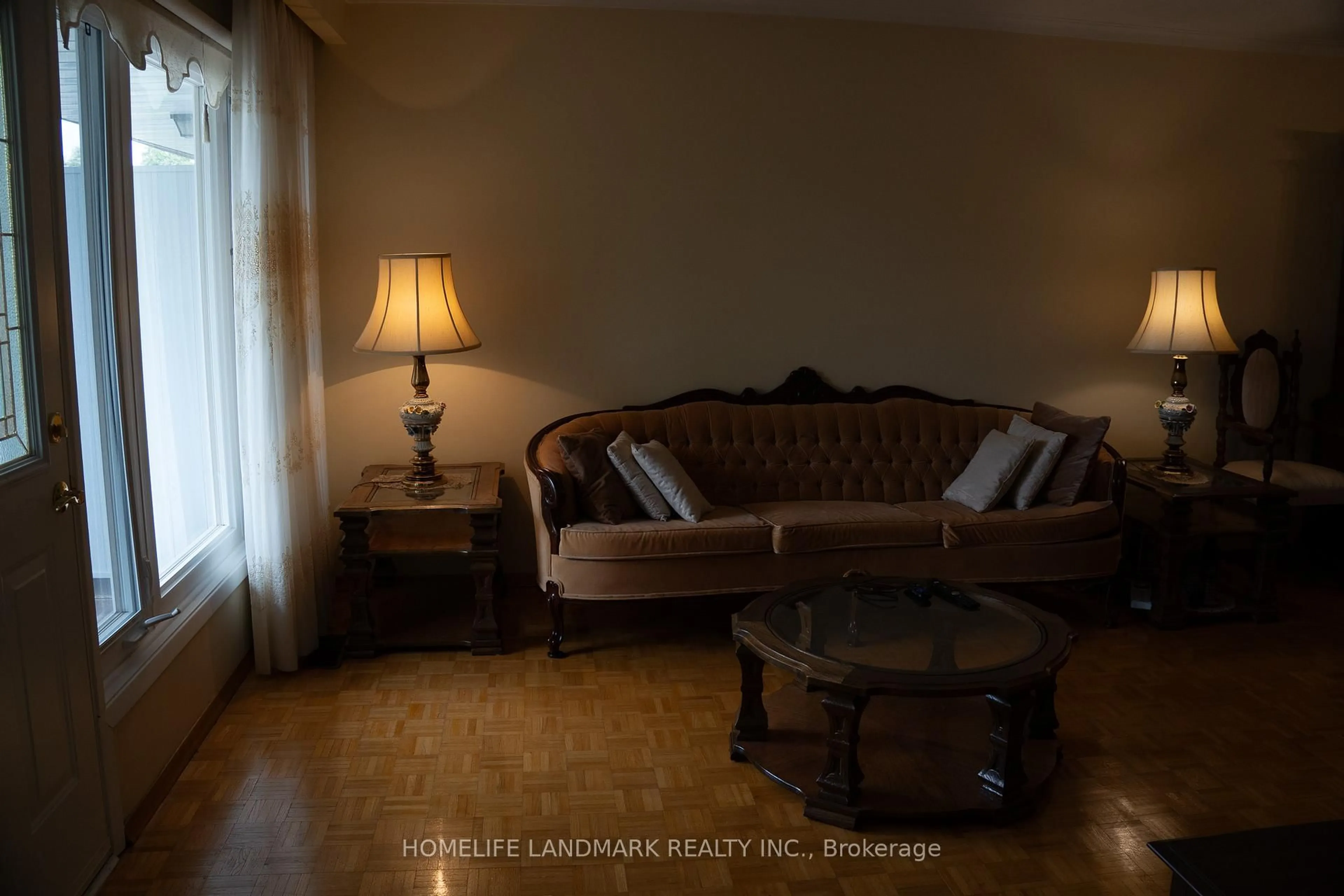 Living room with furniture, wood/laminate floor for 57 Navaho Dr, Toronto Ontario M2H 2X2