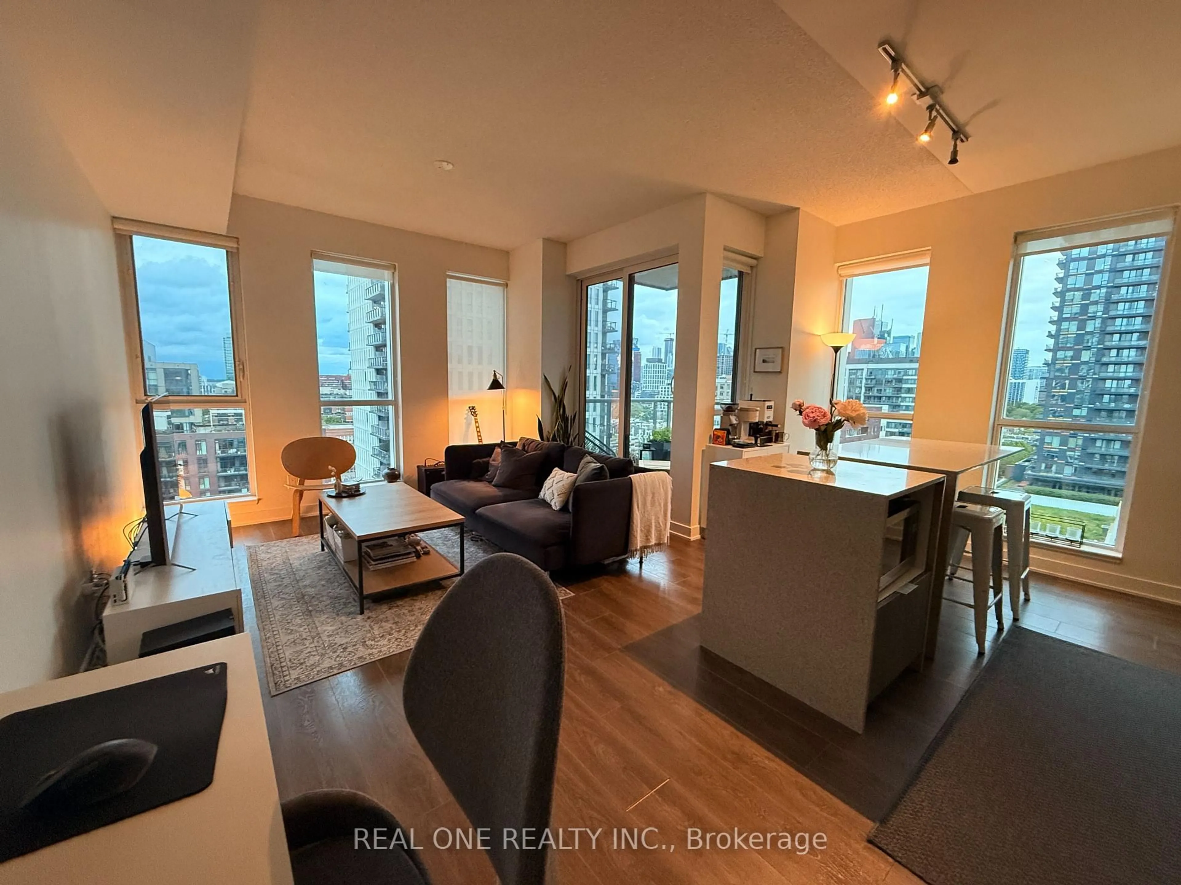 Living room with furniture, wood/laminate floor for 170 Sumach St #1206, Toronto Ontario M5A 0C3