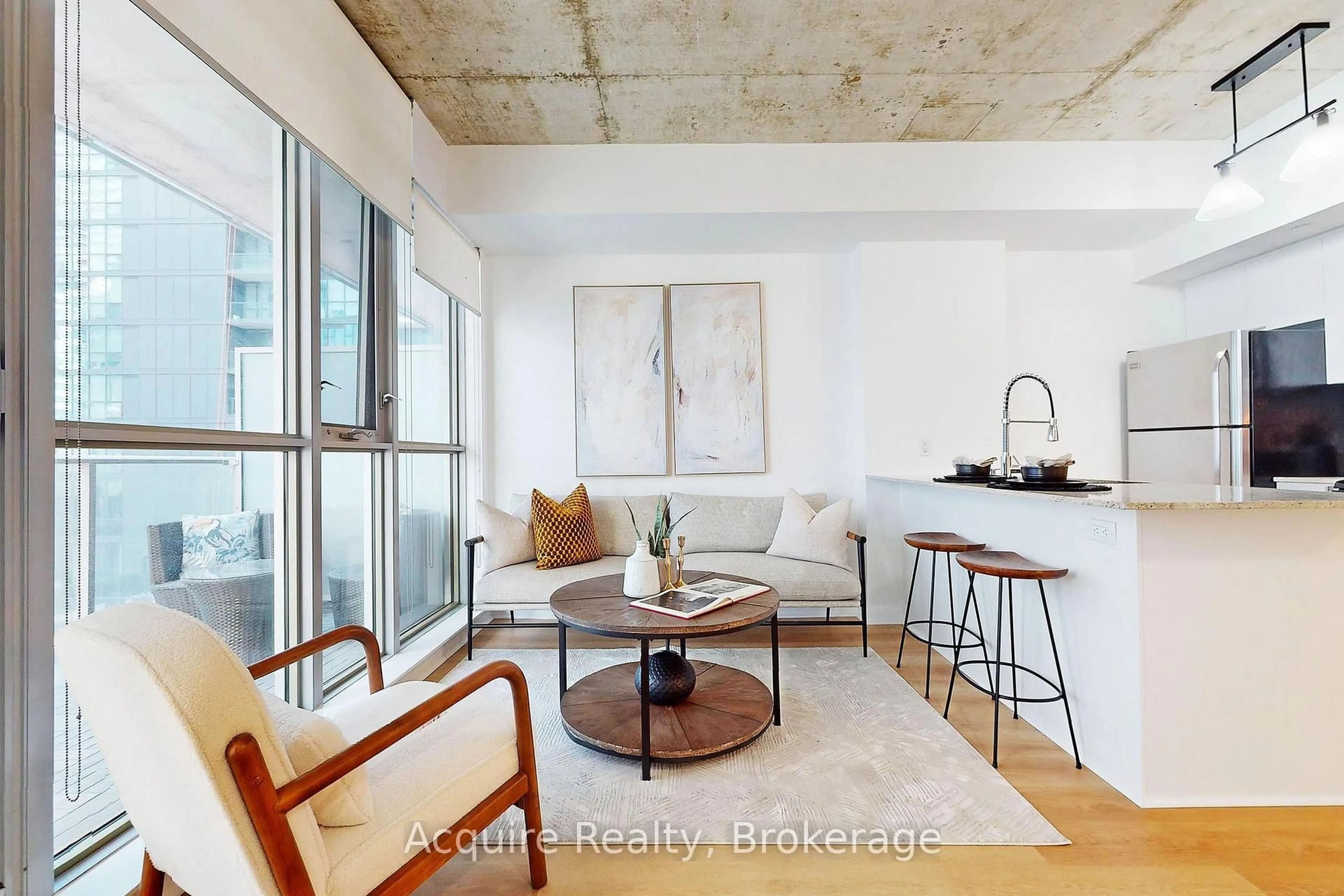 Living room with furniture, cement floor for 375 King St #906, Toronto Ontario M5V 1K5