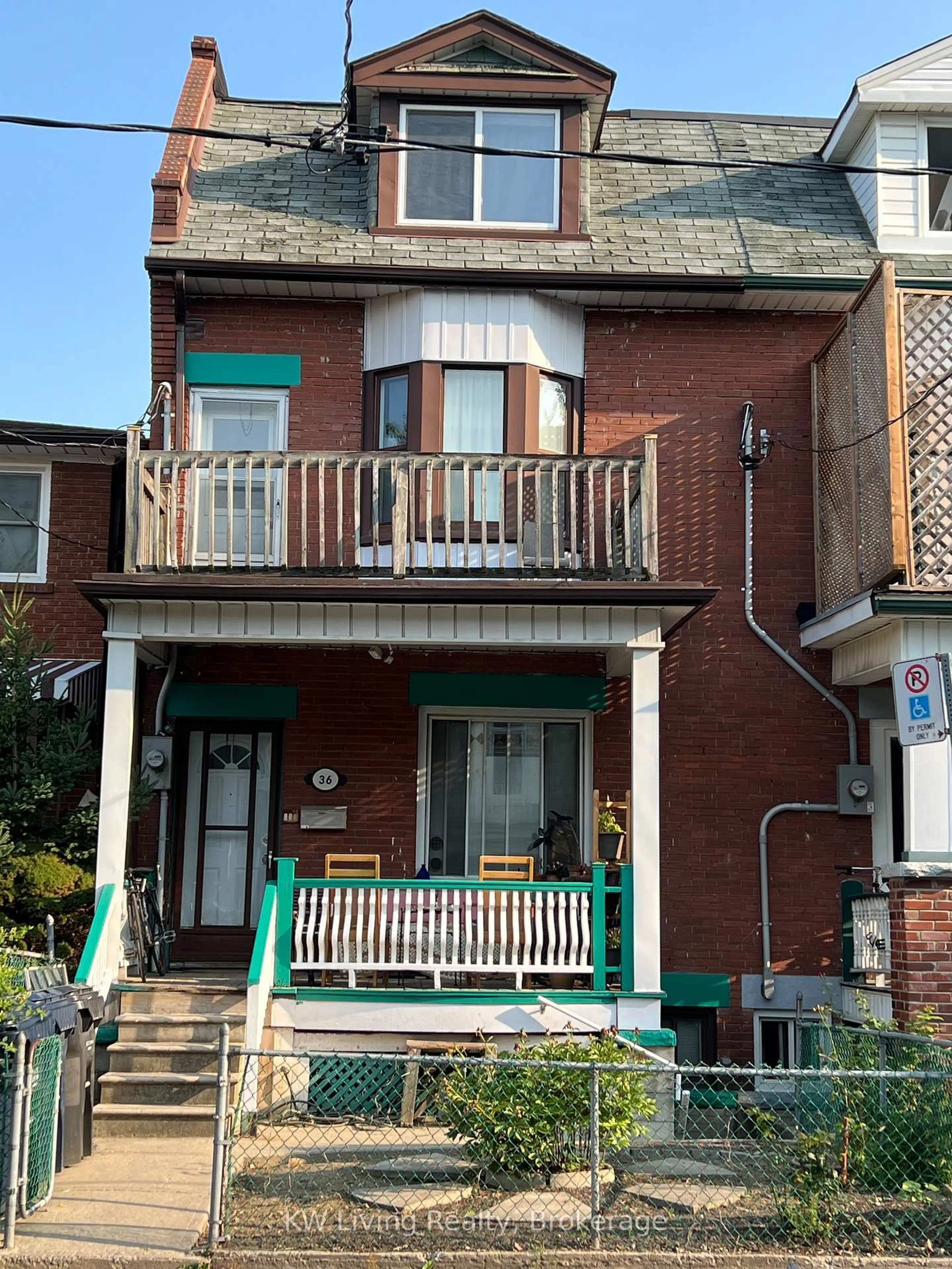 Home with brick exterior material, street for 36 Nassau St, Toronto Ontario M5T 1M2