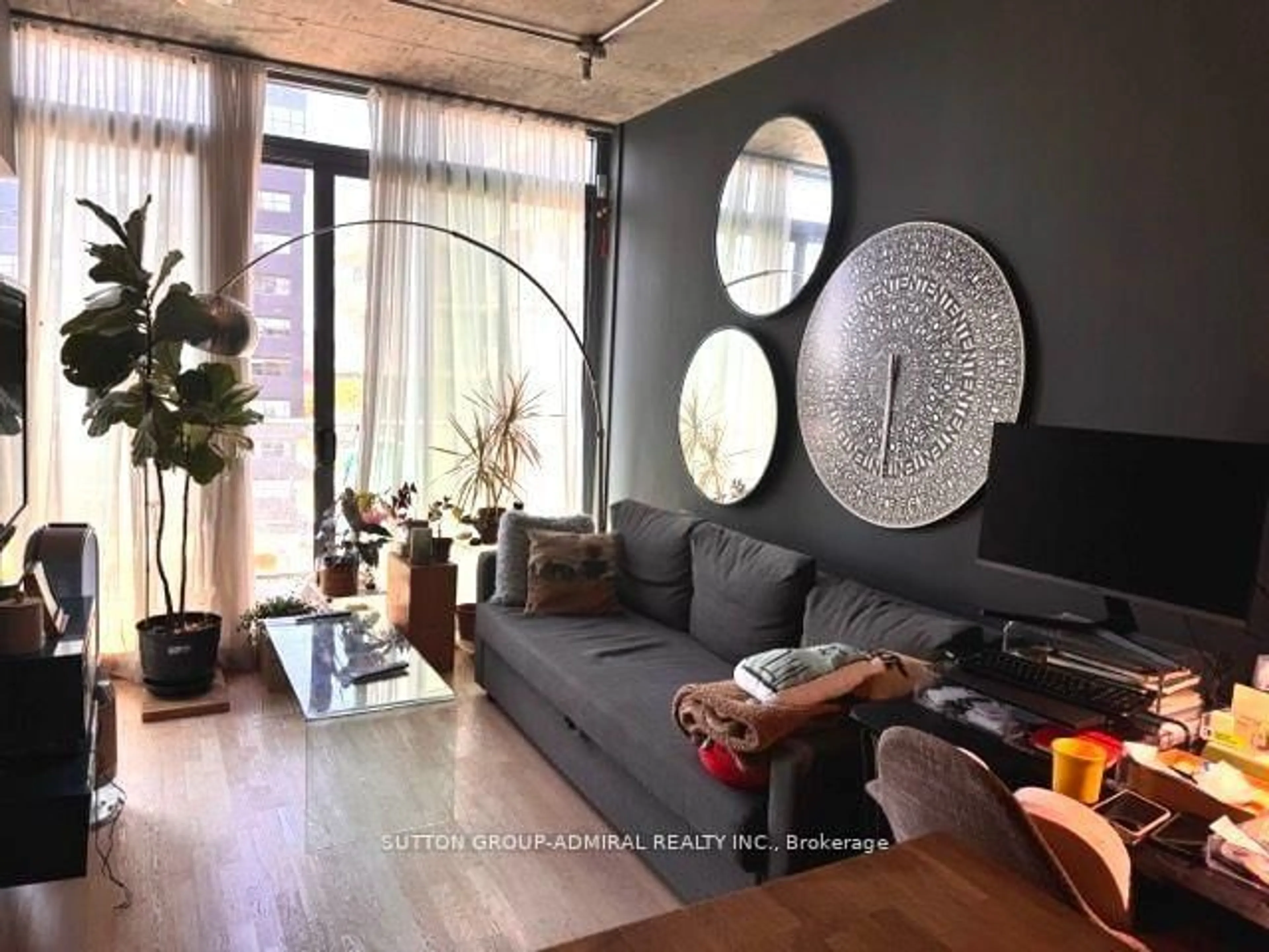 Living room with furniture, wood/laminate floor for 650 KING St #901, Toronto Ontario M5V 0H6