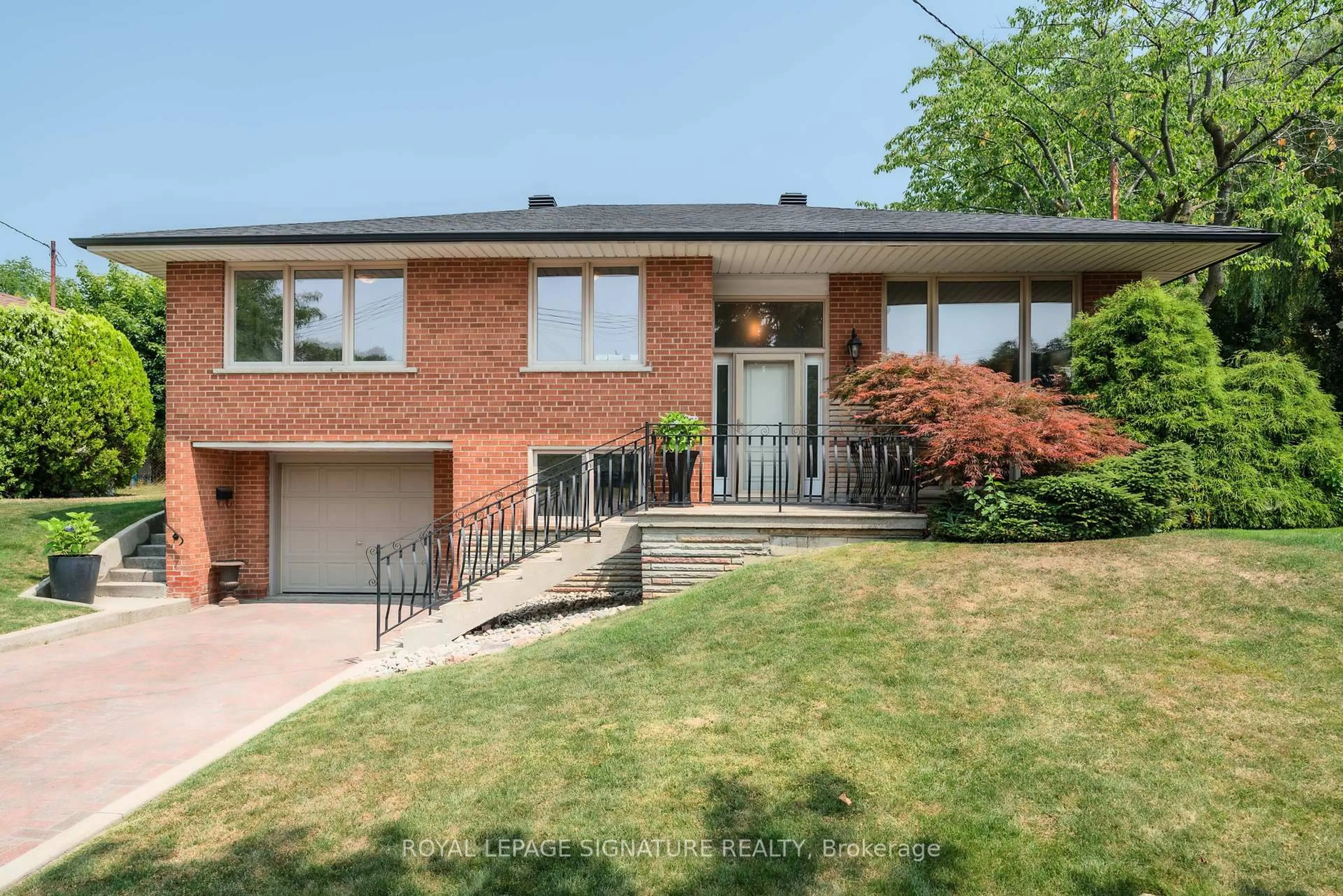Home with brick exterior material, street for 22 Kenewen Crt, Toronto Ontario M4A 1R8
