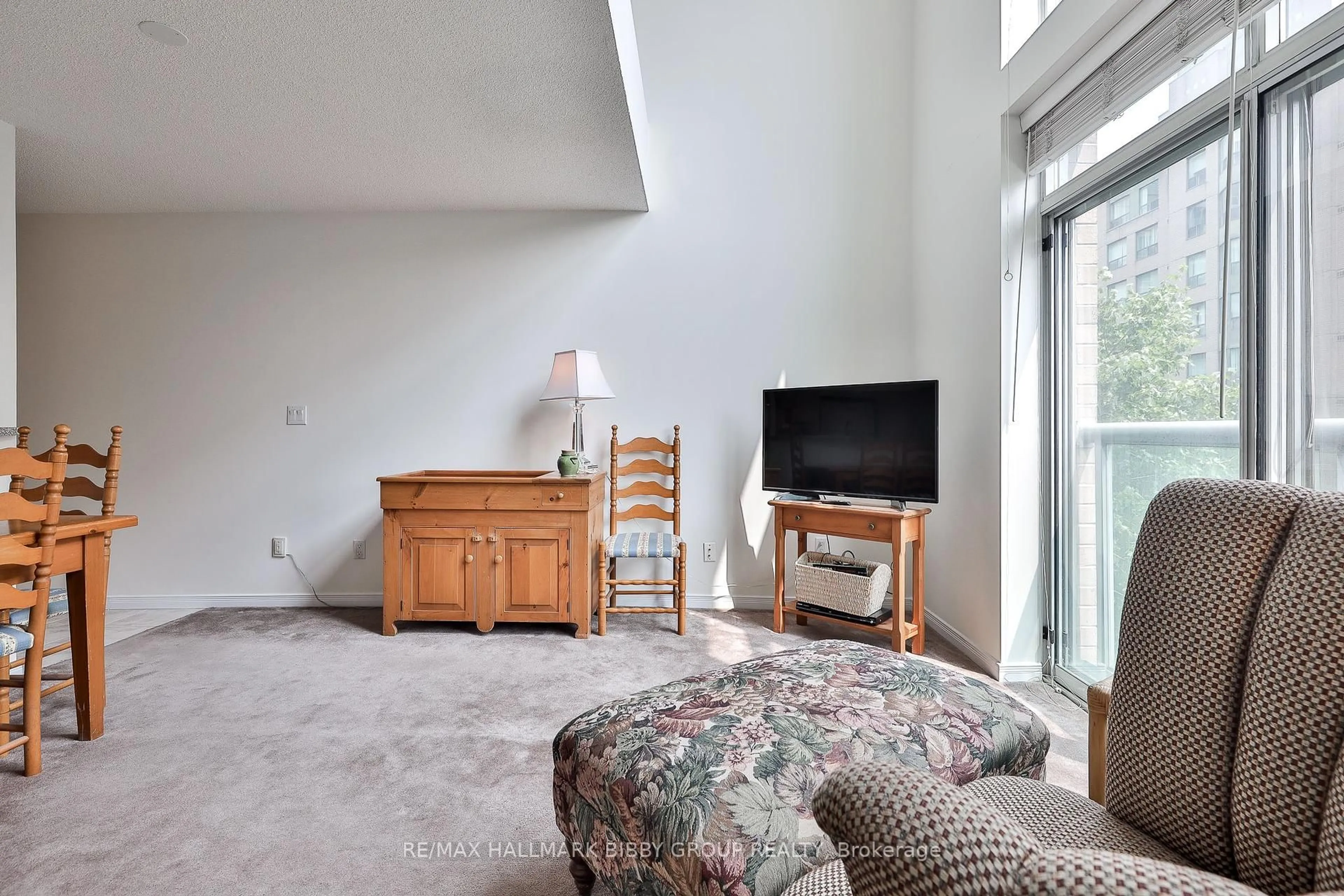 Living room with furniture, unknown for 109 Front St #528, Toronto Ontario M5A 4P7