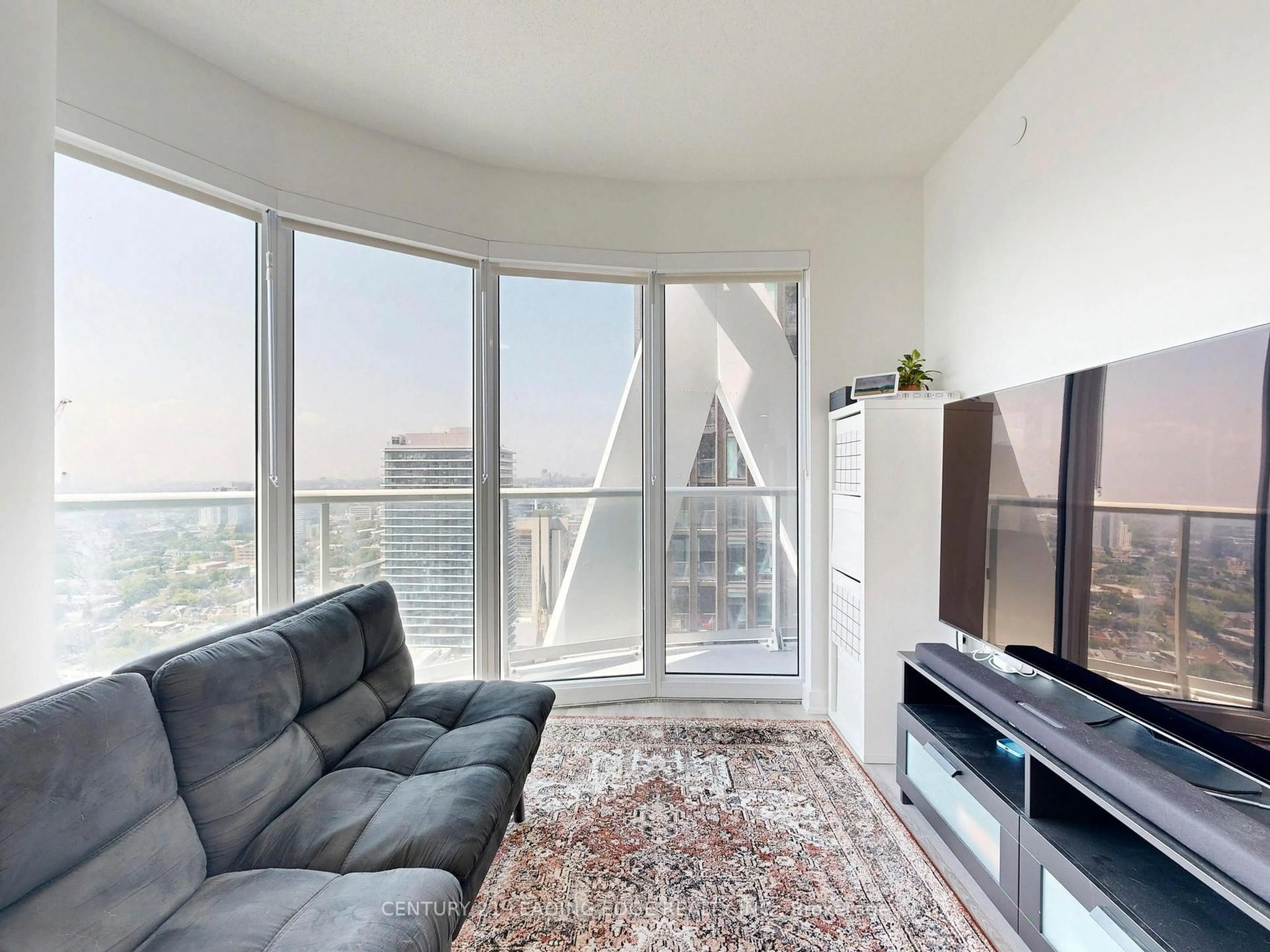 Living room with furniture, unknown for 230 Simcoe St #3019, Toronto Ontario M5T 0G7
