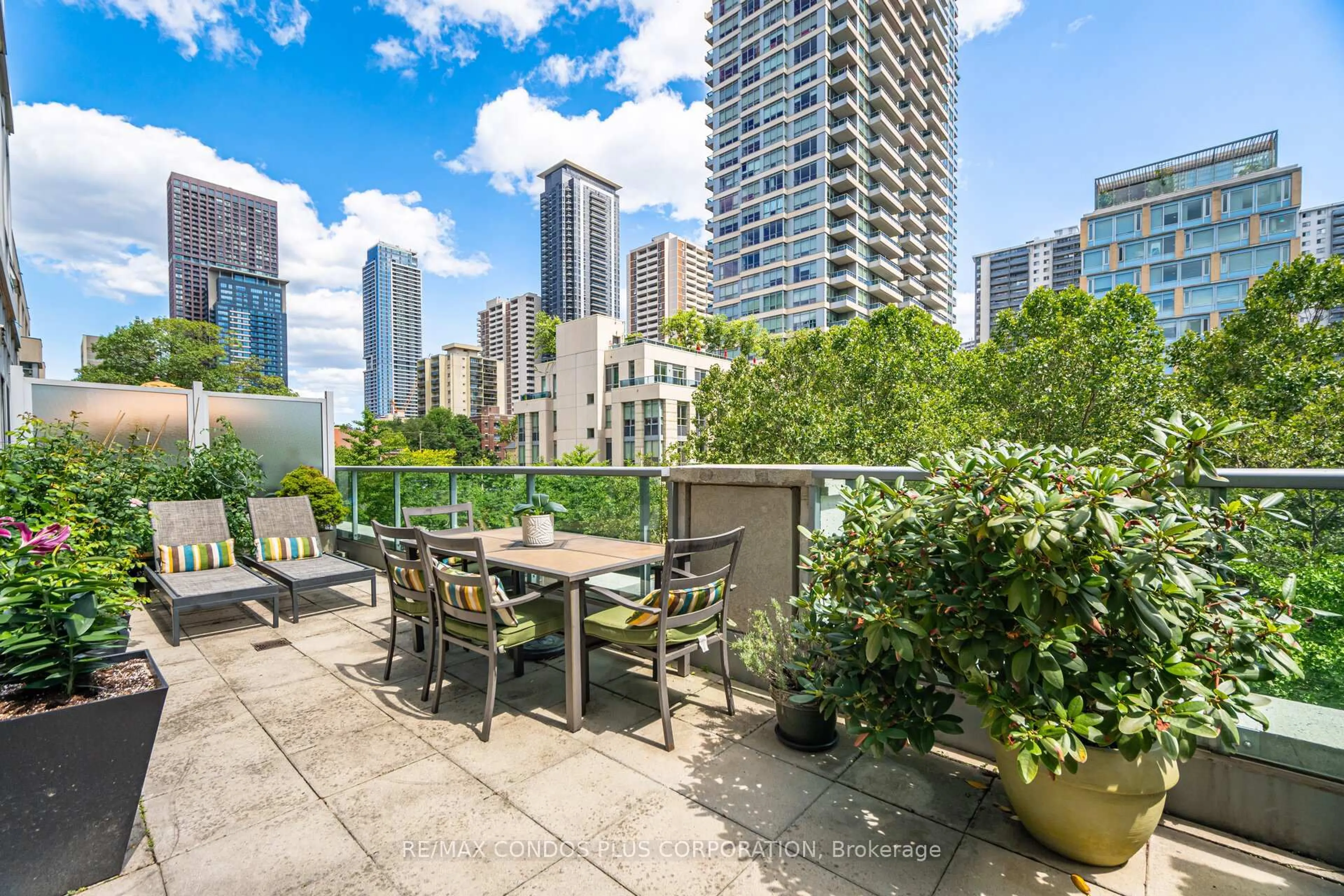 Patio, city buildings view from balcony for 120 Homewood Ave #319, Toronto Ontario M4Y 2J3