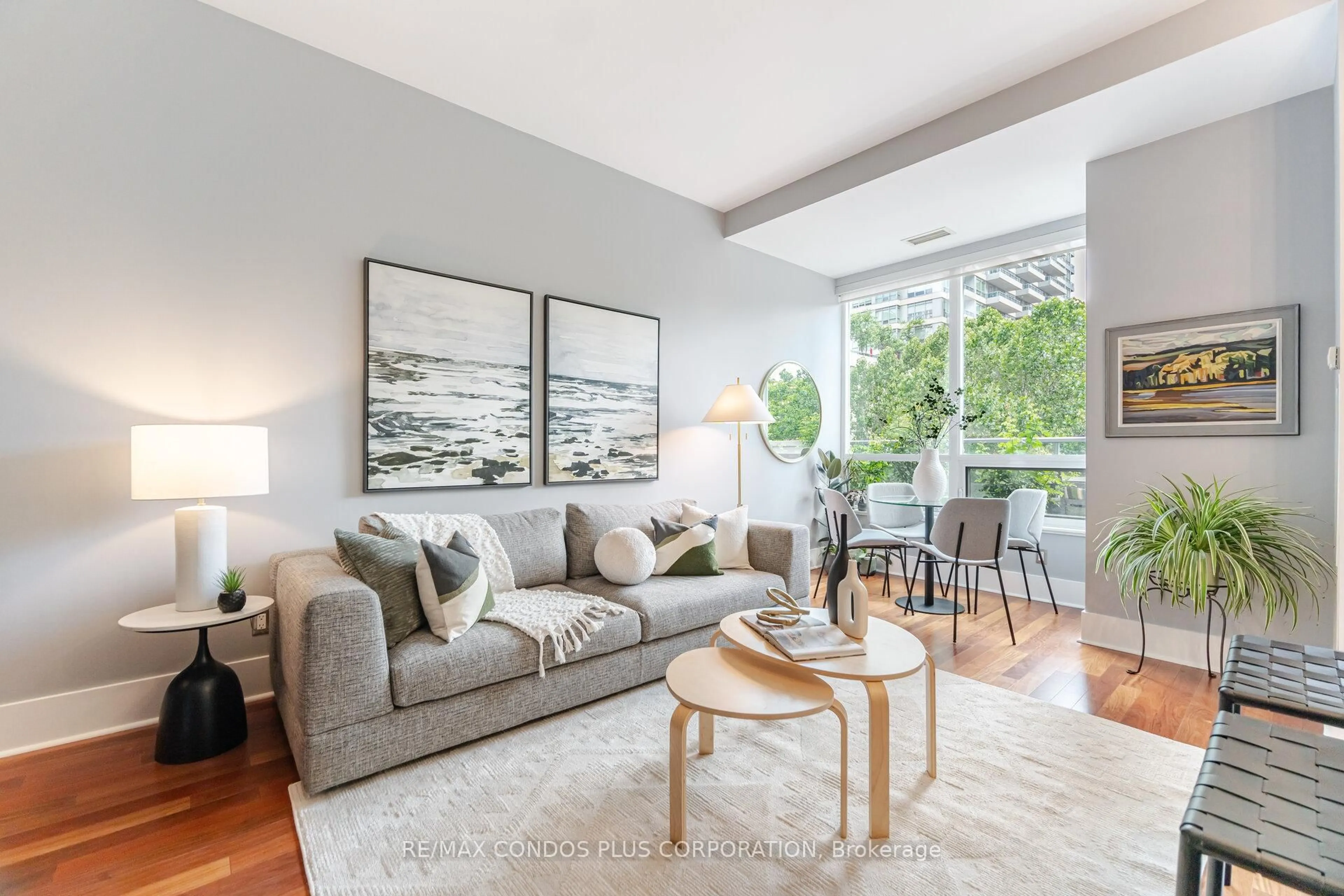 Living room with furniture, unknown for 120 Homewood Ave #319, Toronto Ontario M4Y 2J3