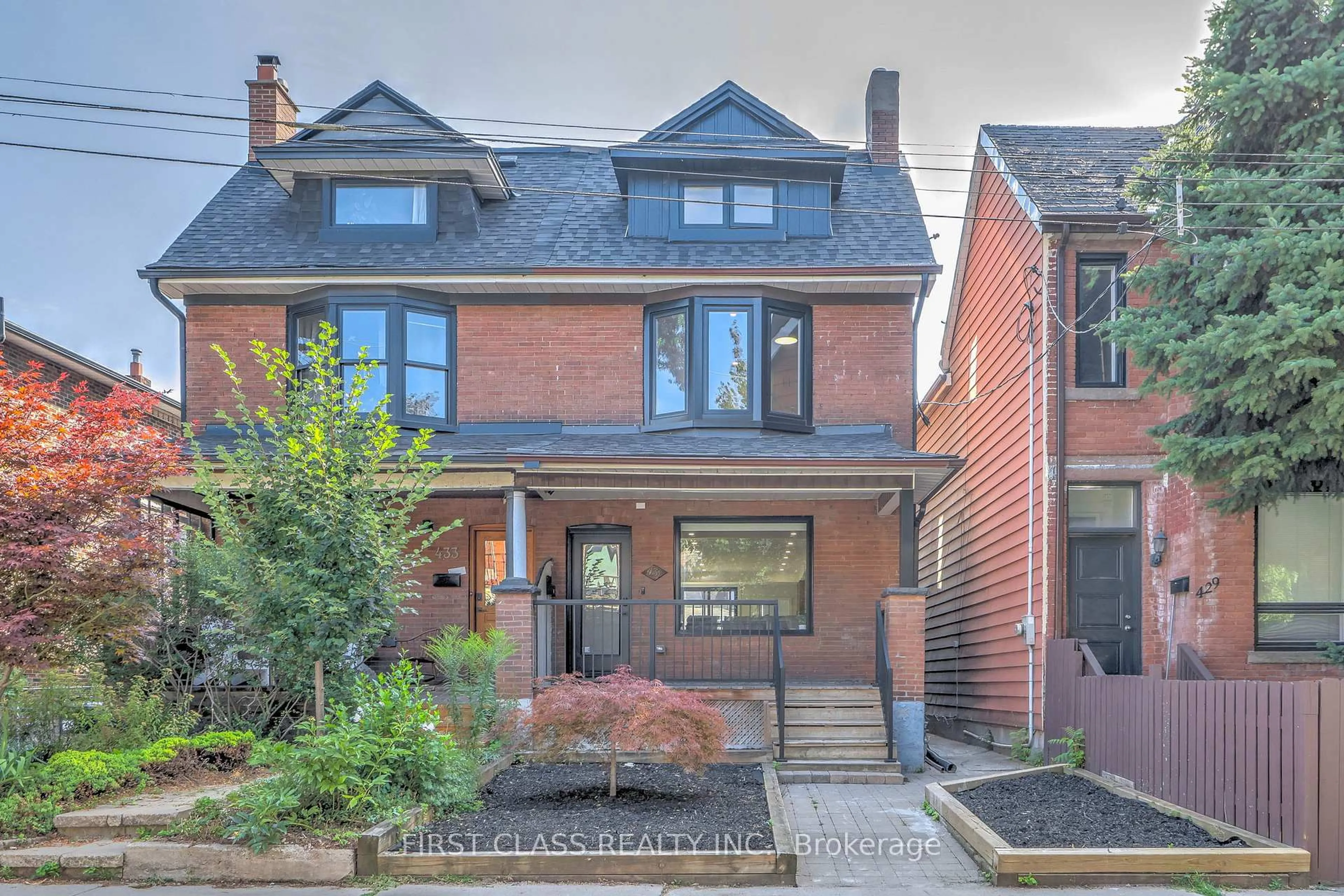 Home with brick exterior material, street for 431 Roxton Rd, Toronto Ontario M6G 3R5