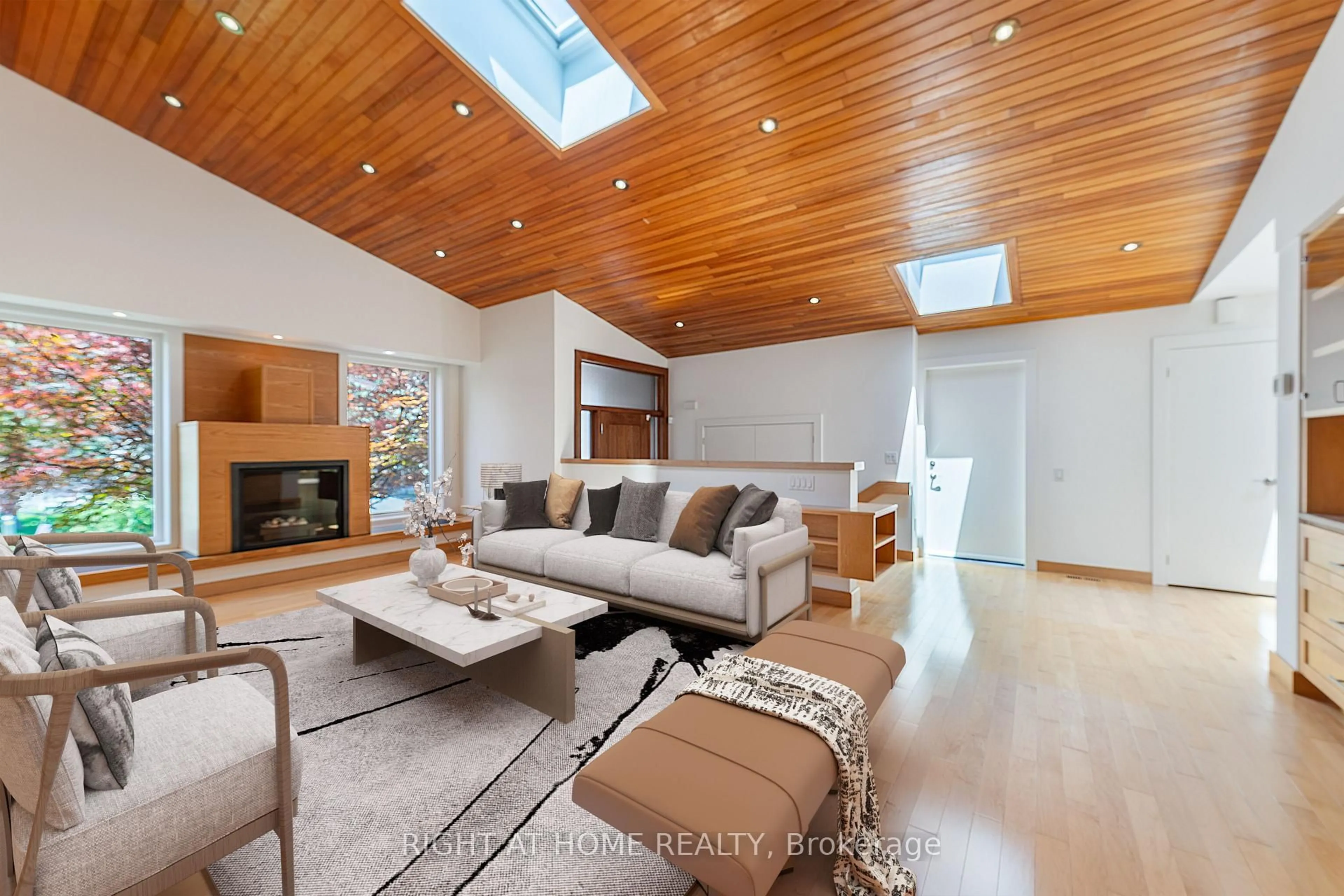 Living room with furniture, wood/laminate floor for 49 Tottenham Rd, Toronto Ontario M3C 2J5