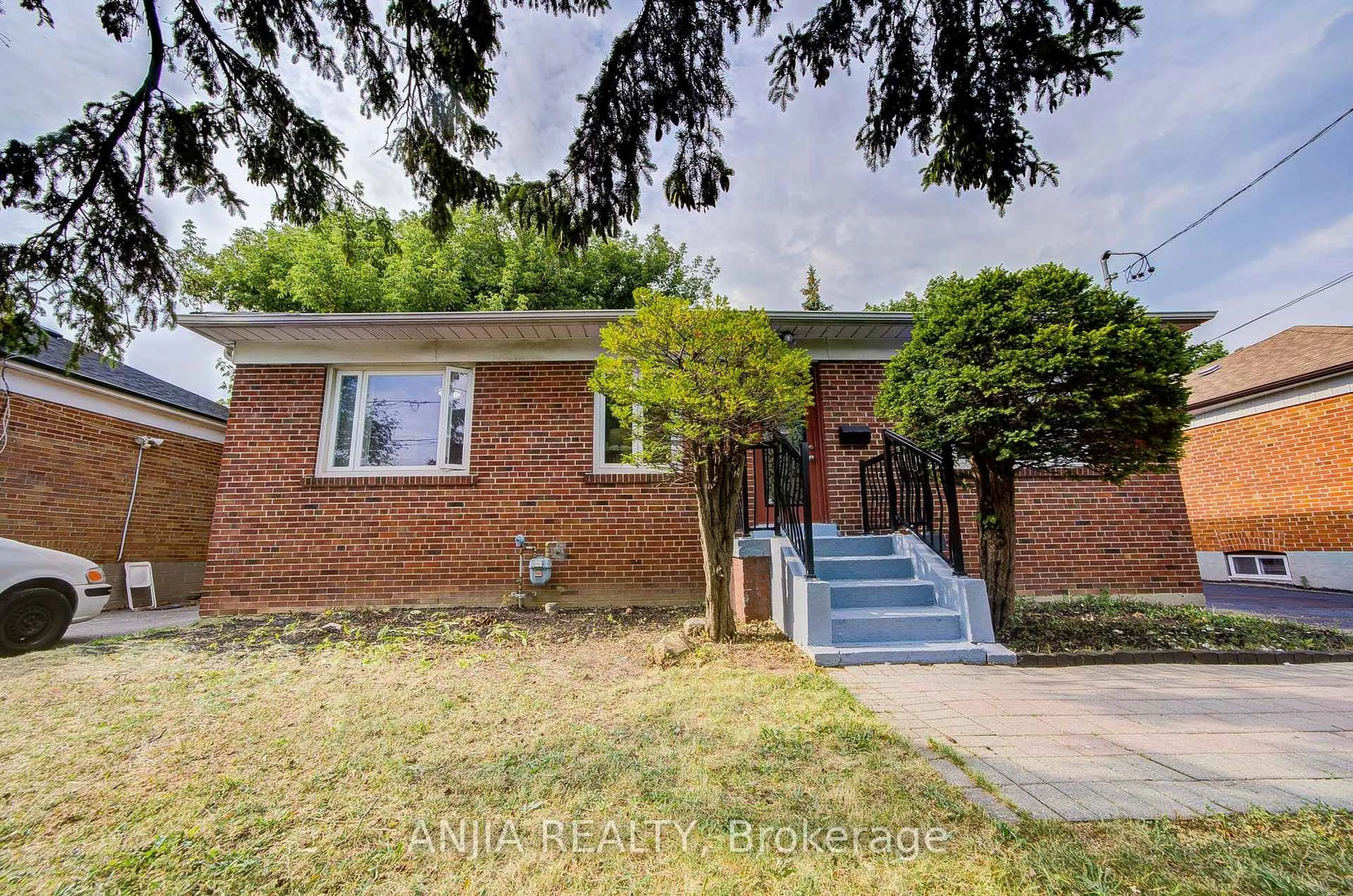 Home with brick exterior material, street for 248 Codsell Ave, Toronto Ontario M3H 3X1