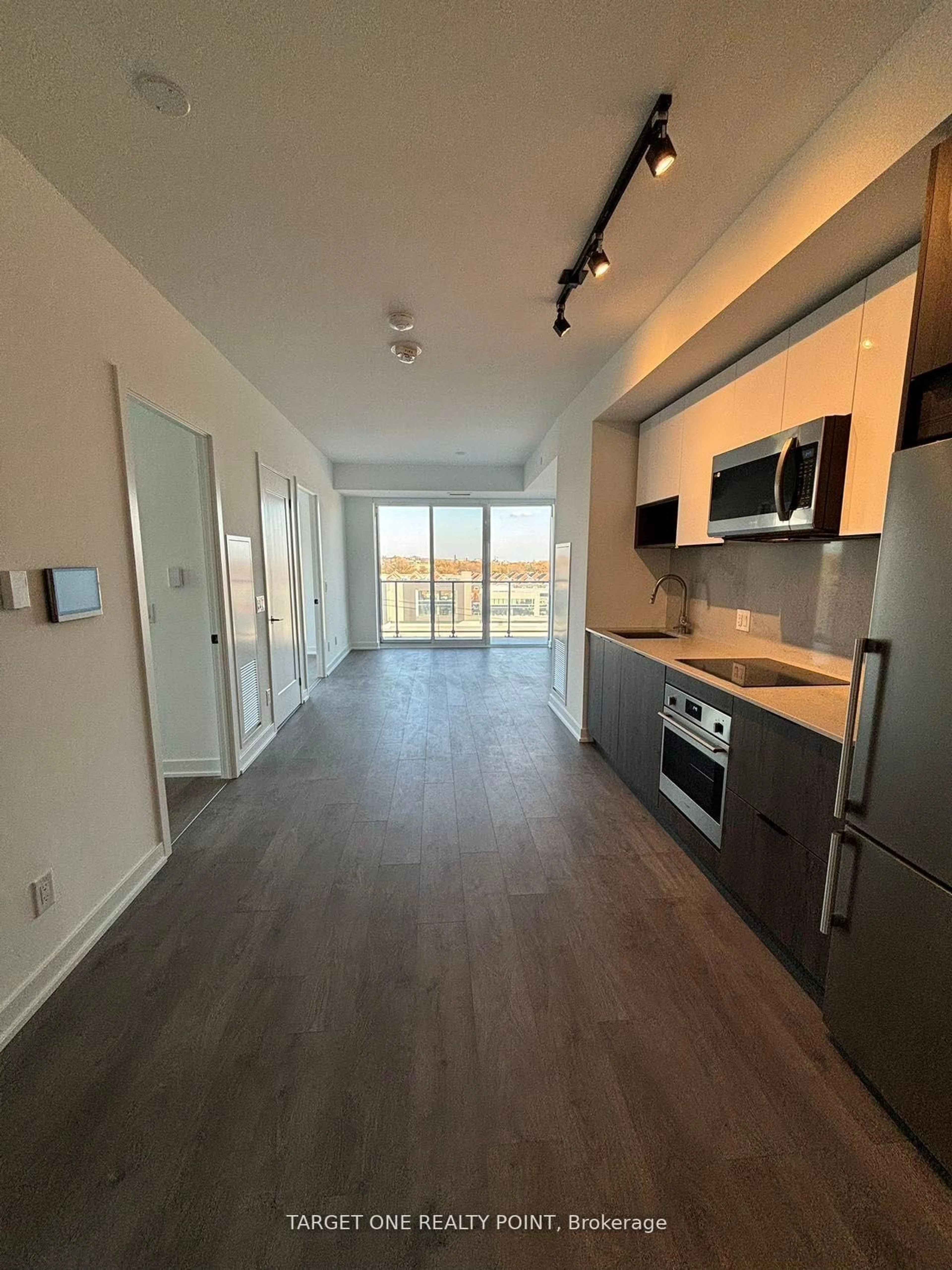 Open concept kitchen, wood/laminate floor for 5 Defries St #601, Toronto Ontario M5A 0W7