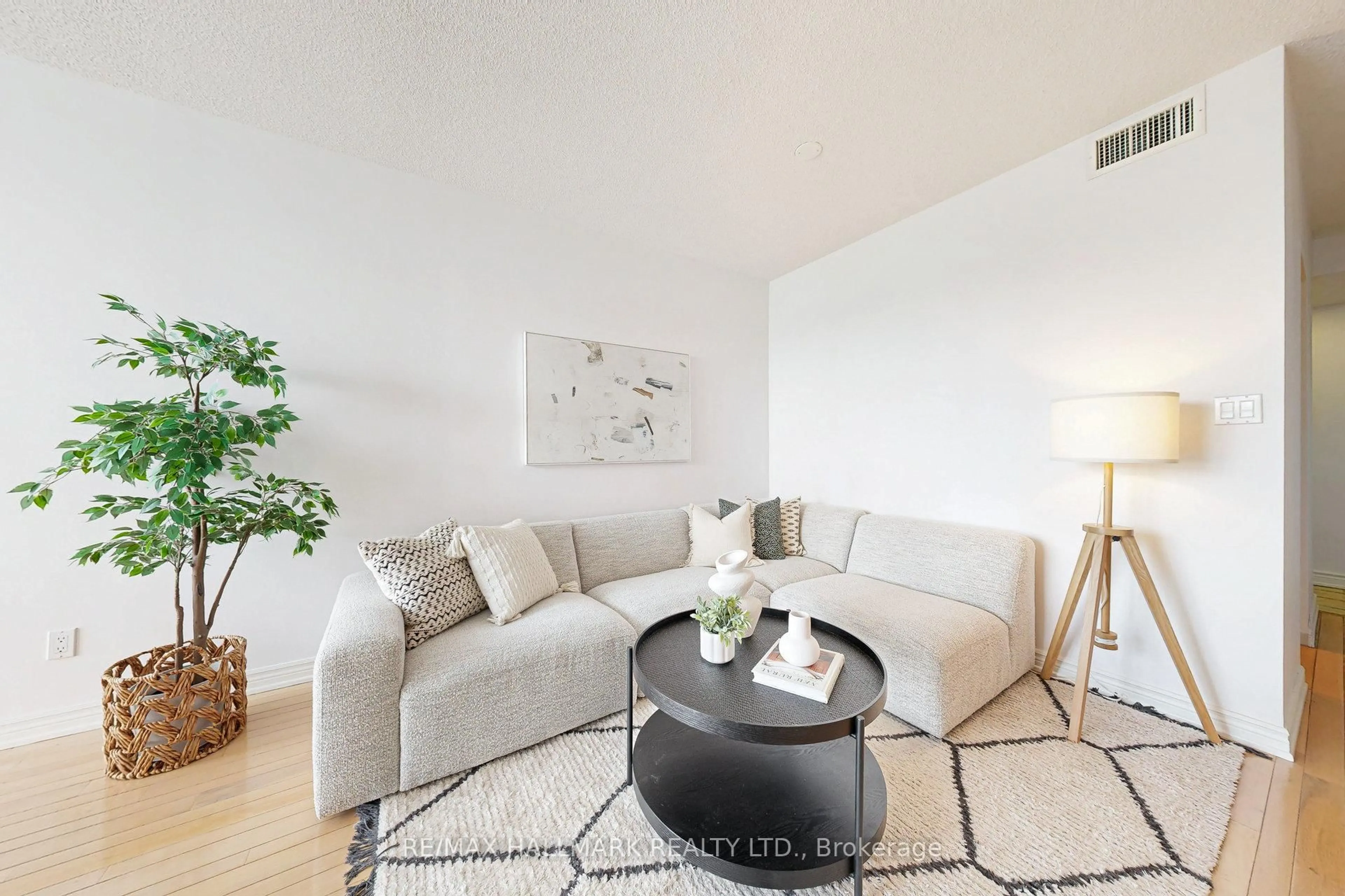 Living room with furniture, unknown for 65 Scadding Ave #924, Toronto Ontario M5A 4L1