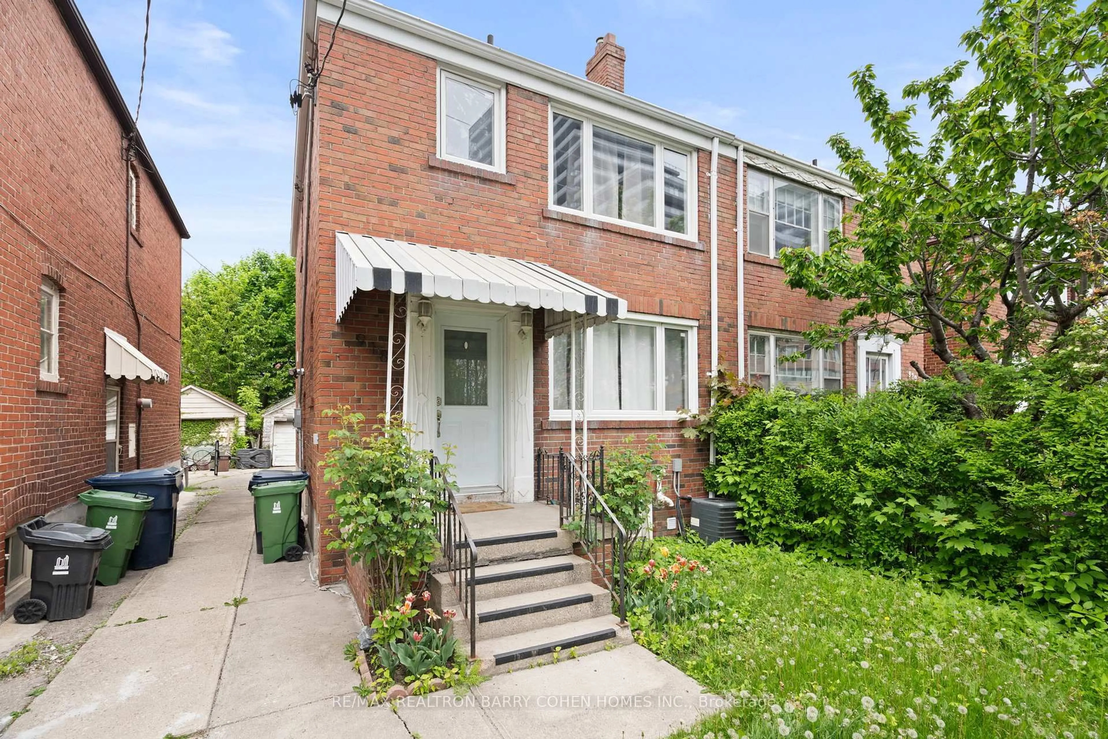 Home with brick exterior material, street for 918 Eglinton Ave, Toronto Ontario M4G 2L3